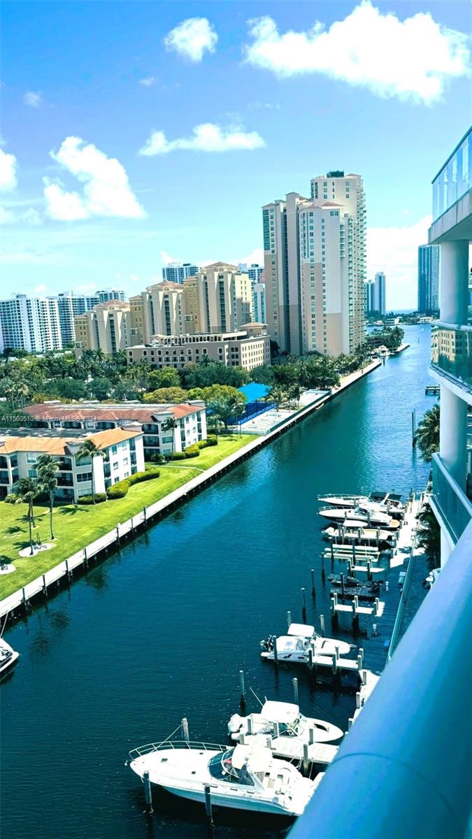 Enjoy spectacular water and city views of beautiful Miami! The location is the best. Close to Aventura Mall and just a bridge to cross for sunny isles beach. Very close also to Turnberry PGA golf course. Lots of shopping and restaurants within walking distance. 3 bedrooms and 2 and 1/2  baths all upgraded porcelain floor throughout the unit. Granite kitchen countertop and stainless steel appliances. Very rare 2-car garage. The atrium offers a 24-hour concierge, valet parking, pool, sauna, gym, and party room. Ready to move in immediately.