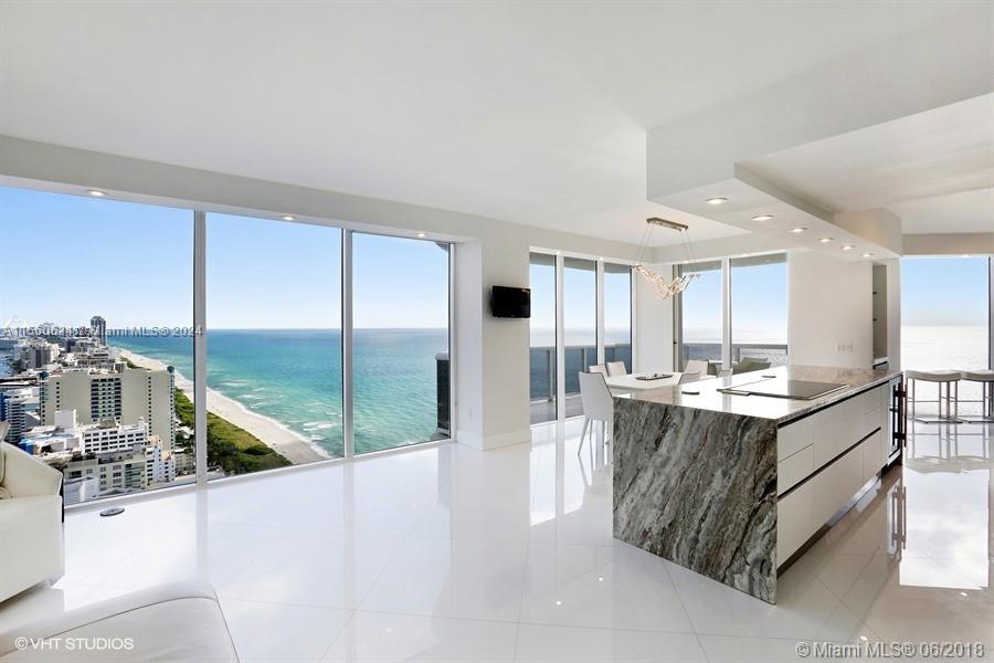 Welcome to Your Oceanfront Oasis! Are you ready to experience the epitome of luxury living in the heart of Miami Beach's Millionaire Row? Look no further than this breathtaking direct ocean corner unit, where every detail exudes elegance and sophistication. Stunning & Unique 3-bedroom, 3.5-bathroom sanctuary boasts unparalleled ocean and city views, offering a panoramic vista of both the bay and the intracoastal. Step into a world of refined taste with white glass tile flooring (32x32), Italian quartz countertops, and a dazzling quartzite island in the kitchen. top-of-the-line Wolf SubZero appliances and electric shades throughout, providing both comfort and style. Exquisite Imported Italian and Artefacto furnishing. Unparalleled access to Miami's most coveted destinations.