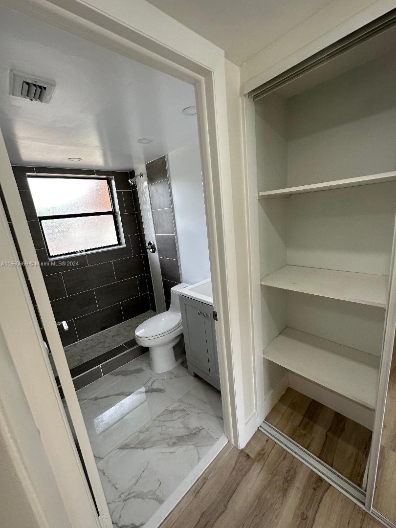 2nd closet in Master Bedroom with organizers