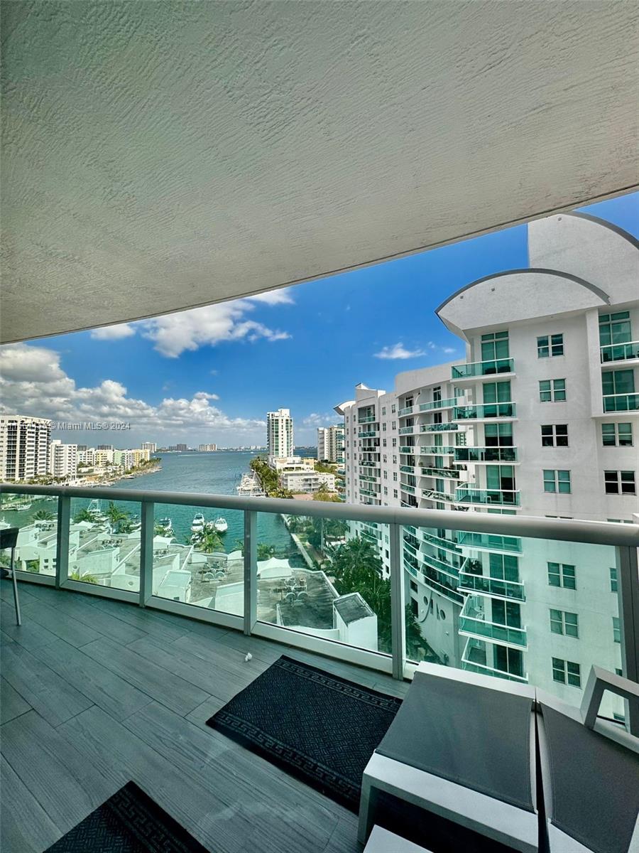 Resort Living Style! Great Unit 2 Bed, 2 Bath designer unit. Enjoy the stylish inside and outside breeze and water views.
White porcelain flooring throughout the entire unit, glass sliding doors to enjoy beautiful intracoastal & pool views from the balcony which is accessible from the living room & master bedroom allowing plenty of natural light to come in. Open kitchen with Italian cabinetry & brand new stainless steel appliances and washer and dryer. Master Bathroom offers stand up shower & roman tub. This unit also comes with 1 assigned garage. The 360 condominium offers a variety of amenities like Gym, sauna, pool, & Jacuzzi access. MUST SEE !!! SHOW ASSIST
It has an excellent location: 7 minutes to the beach, 15 minutes to the Design District, and 15 minutes to Bal Harbour Shops.
