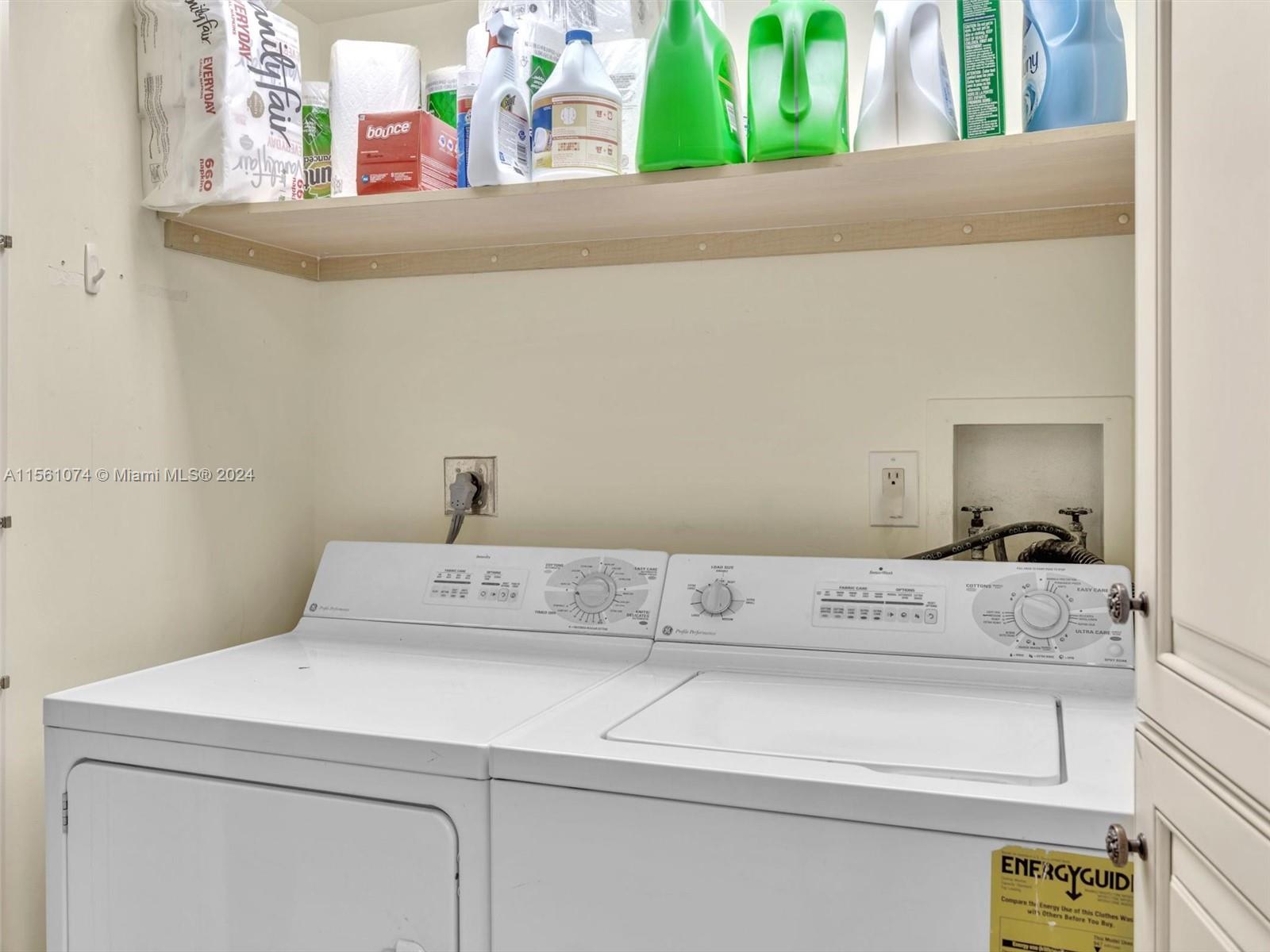 NICE SIZE LAUNDRY AREA FITS SIDE BY SIDE WASHER AND DRYER