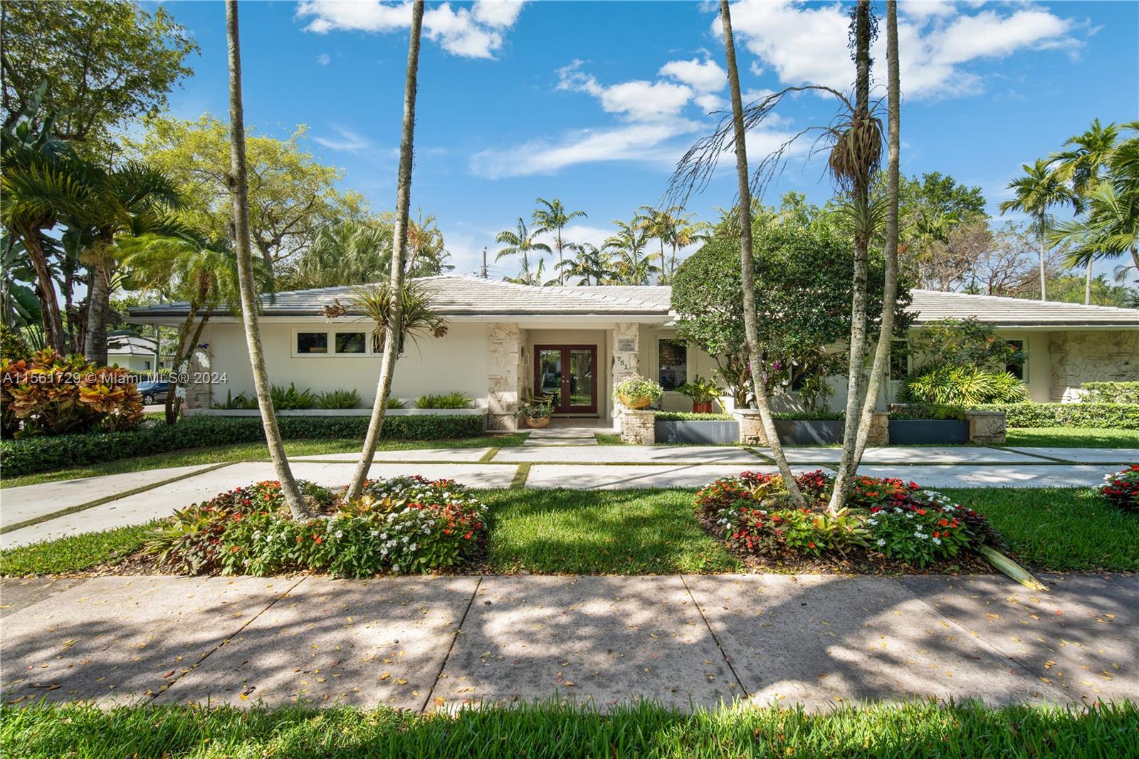 Sought after South Gables Location! Enter this lushly landscaped  5 bedroom / 4 bath gem which features a heated pool and screened patio, side-entry double car garage, and updates including: New septic tank and drain field, impact windows & shutters, copper hot water pipes, remodeled primary bathroom, new floors in three of the bedrooms. Excellent schools! A must see!