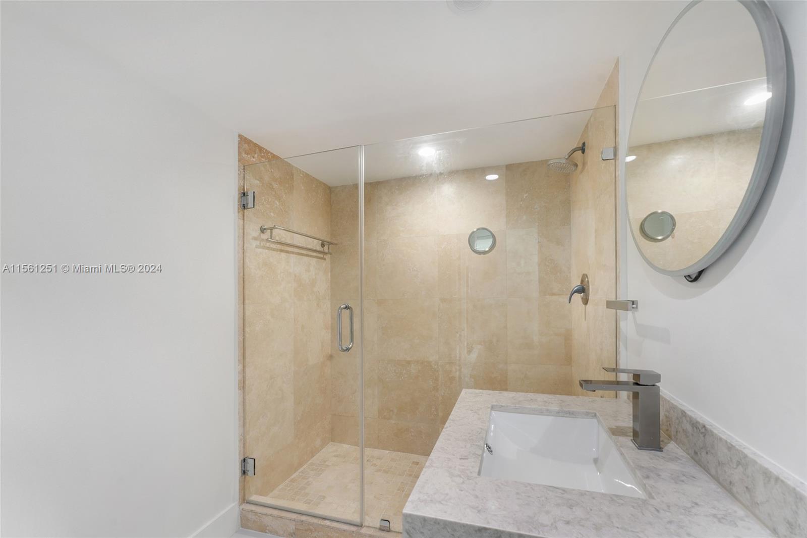 Bathroom at the entrance of the unit.