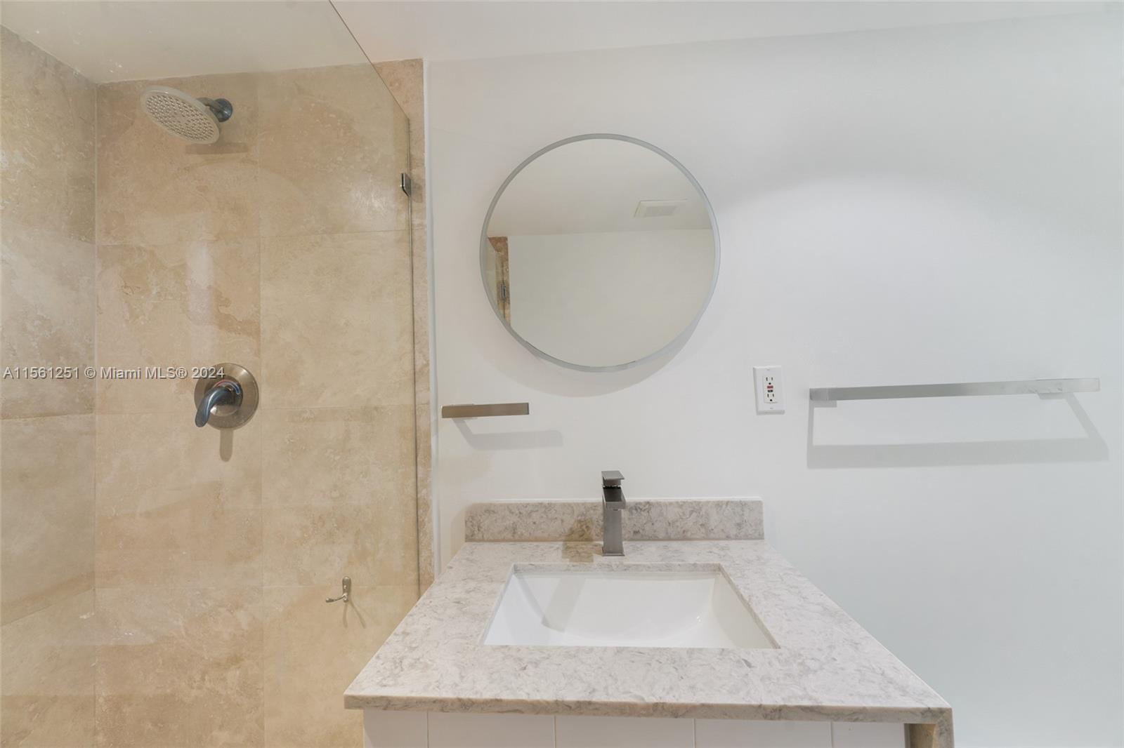 Bathroom at the entrance of the unit.
