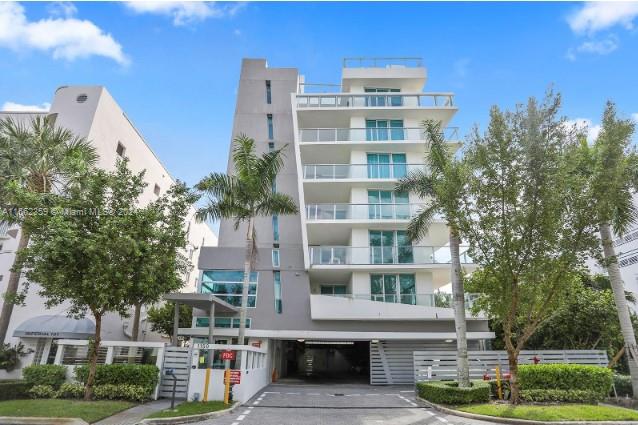 Airbnb-approved building! Exclusivity defines this modern condo in the heart of Bay Harbor Islands - with only 17 residences, this building is designed for discerning buyers seeking a centric Miami location with a tranquil and private lifestyle of a quaint and elegant town. Just steps from Bal Harbor Shops, this spectacular building offers a rooftop pool, gym, spacious storage lockers, and 2 garage spaces, lift. Residence 503, with 1,741 total SF, has two bedrooms plus den, two full bathrooms, and a summer kitchen on an expansive 445 SF wrap-around balcony. Bright and spacious apartment with floor-to-ceiling windows and doors throughout. Don't miss this opportunity, it is a must-see.