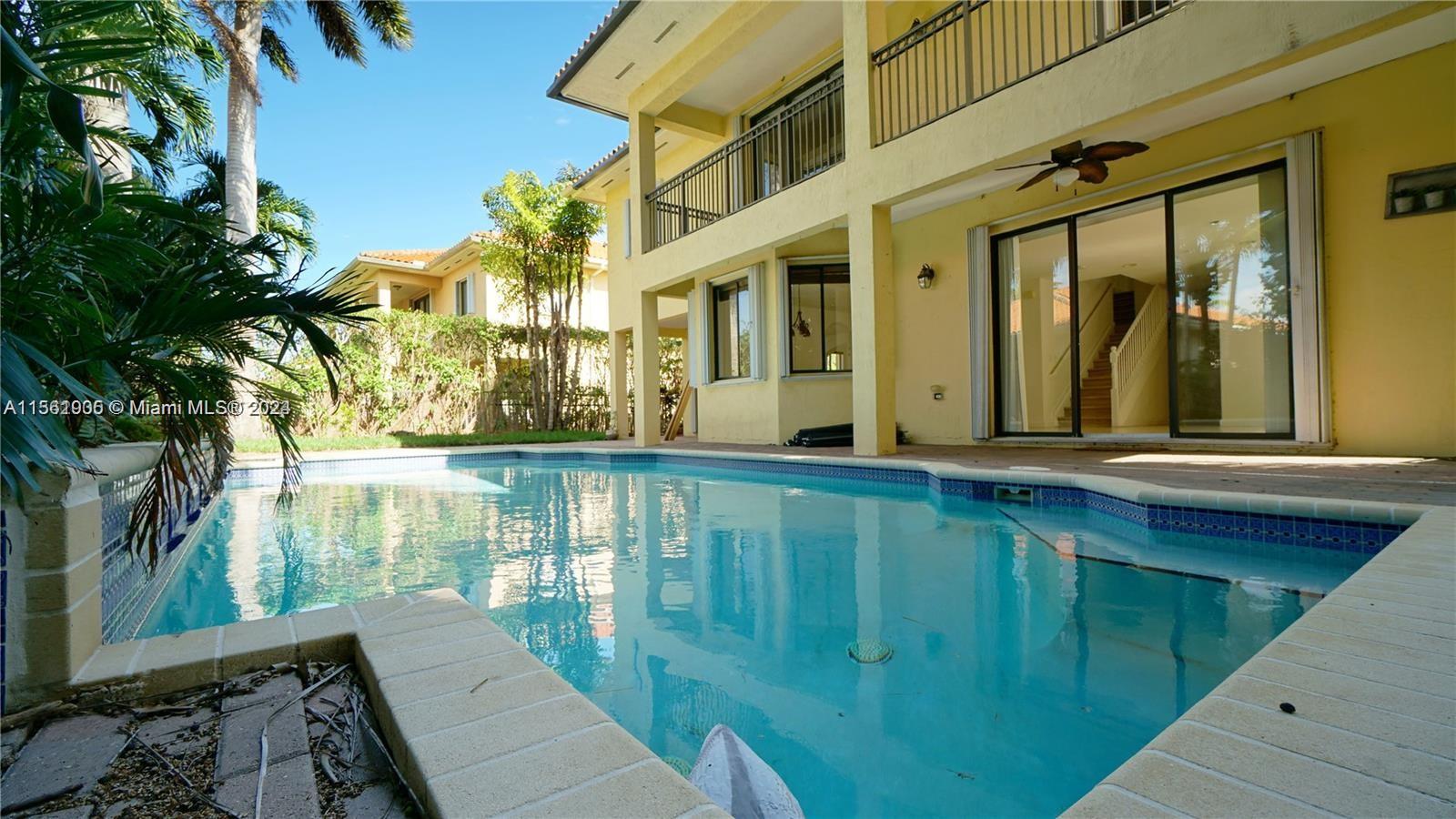 Spacious pool home in Cutler Cay! This home is the Milan model, it has 1 bedroom on the ground floor and 4 bedrooms on the 2nd floor. This home has a wonderful back patio with good size pool. Cutler Cay is a gated community, which has roaming patrol. In addition there is a community club house over looking a lake. The club house has lots of activities, and amenities to enjoy including tennis, etc.