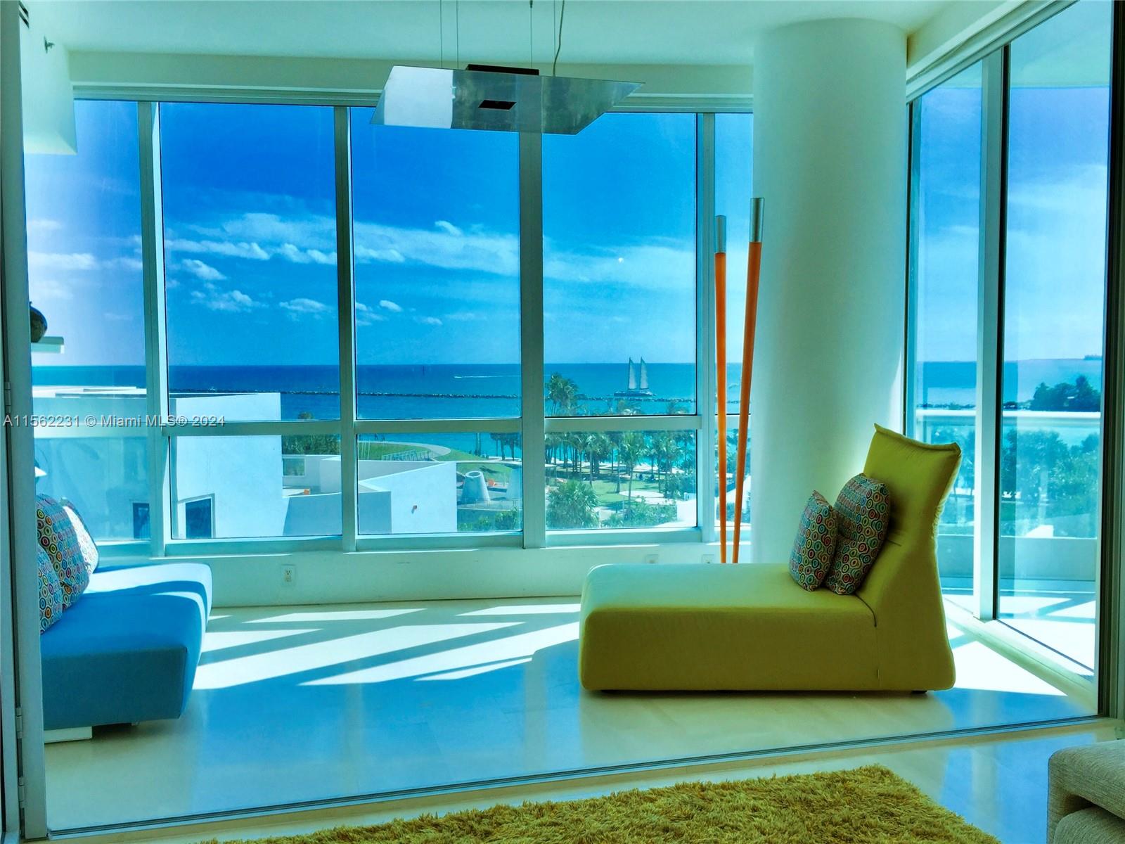 living room / 3rd bedroom option with sliding wall and Murphy queen bed already installed