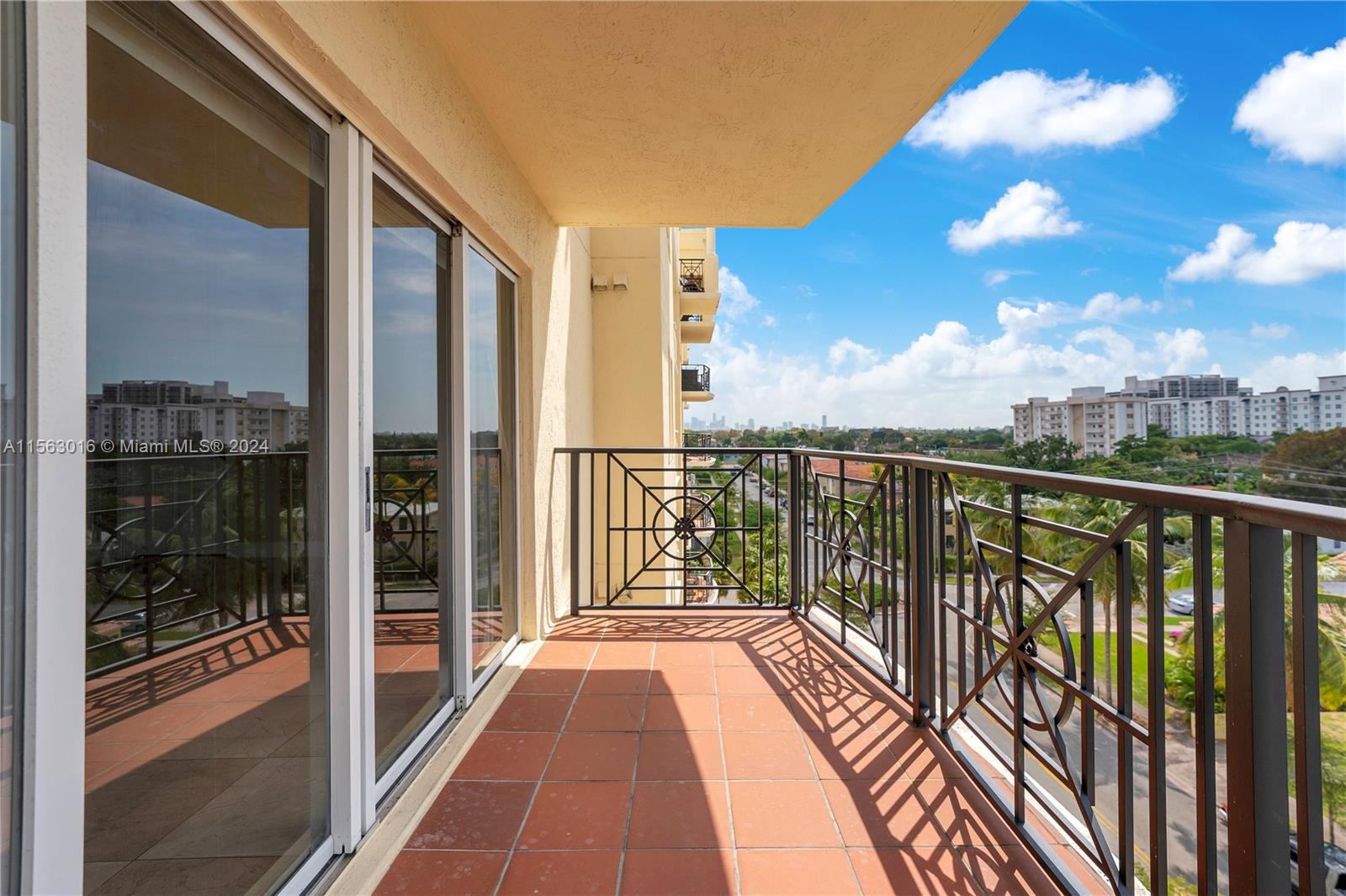 Balcony southwest view to downtown Coral Gables & Brickell skyline.