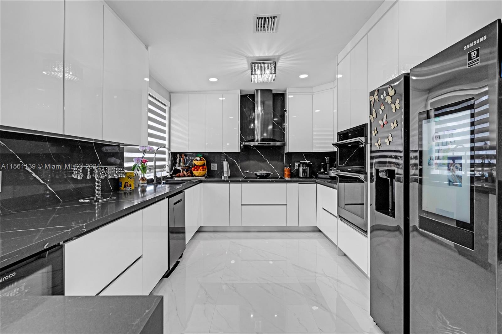 THE OUTSIDE IS A SLEEPER .. MAIN AND IN LAW HAVE BEEN RENOVATED, LOTS OF SPACE FOR OUTSIDE ENTERTAINMENT W GROVE. LOCATED ON A CORNER..