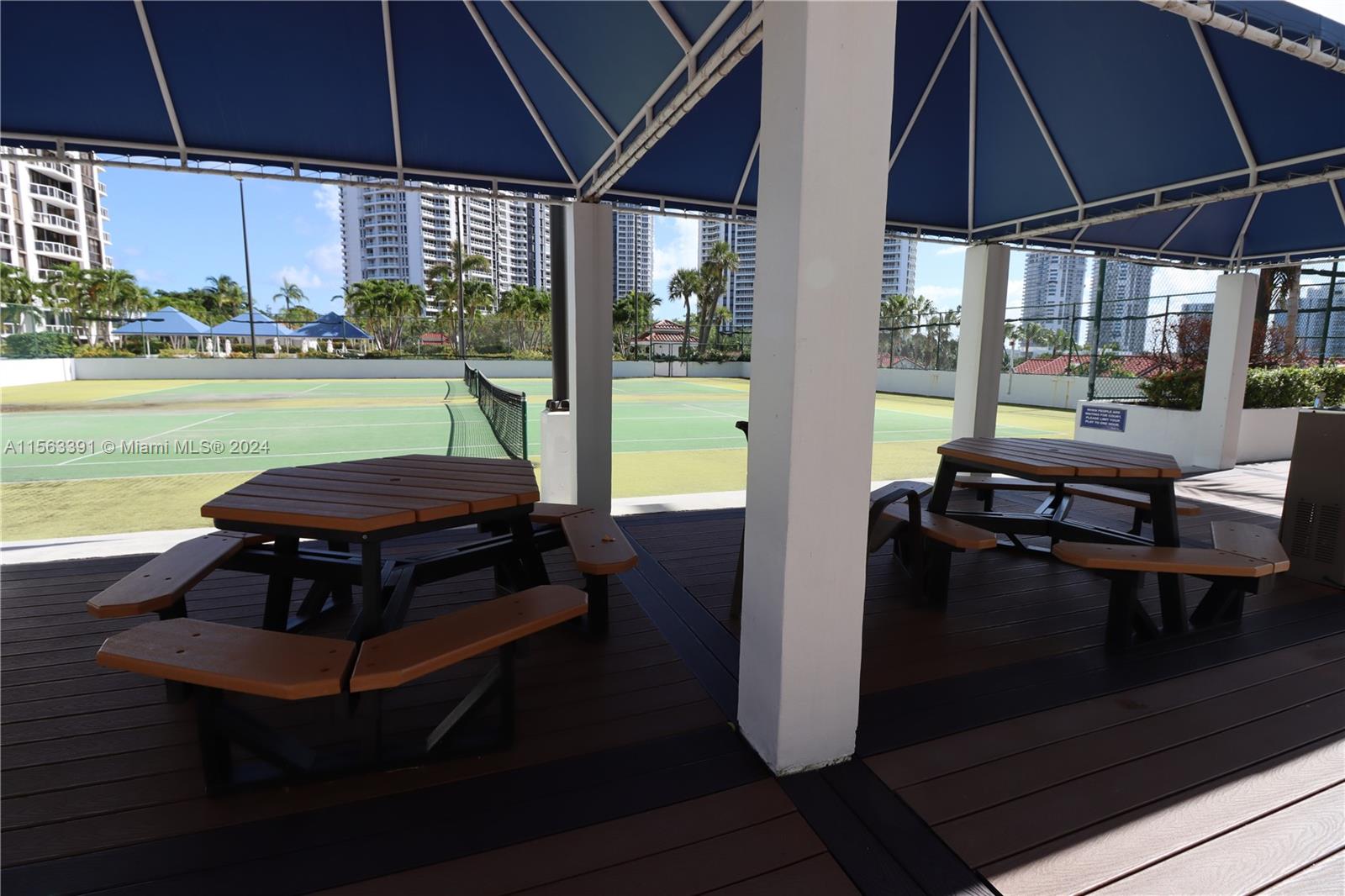 Picnic area next to tennis courts