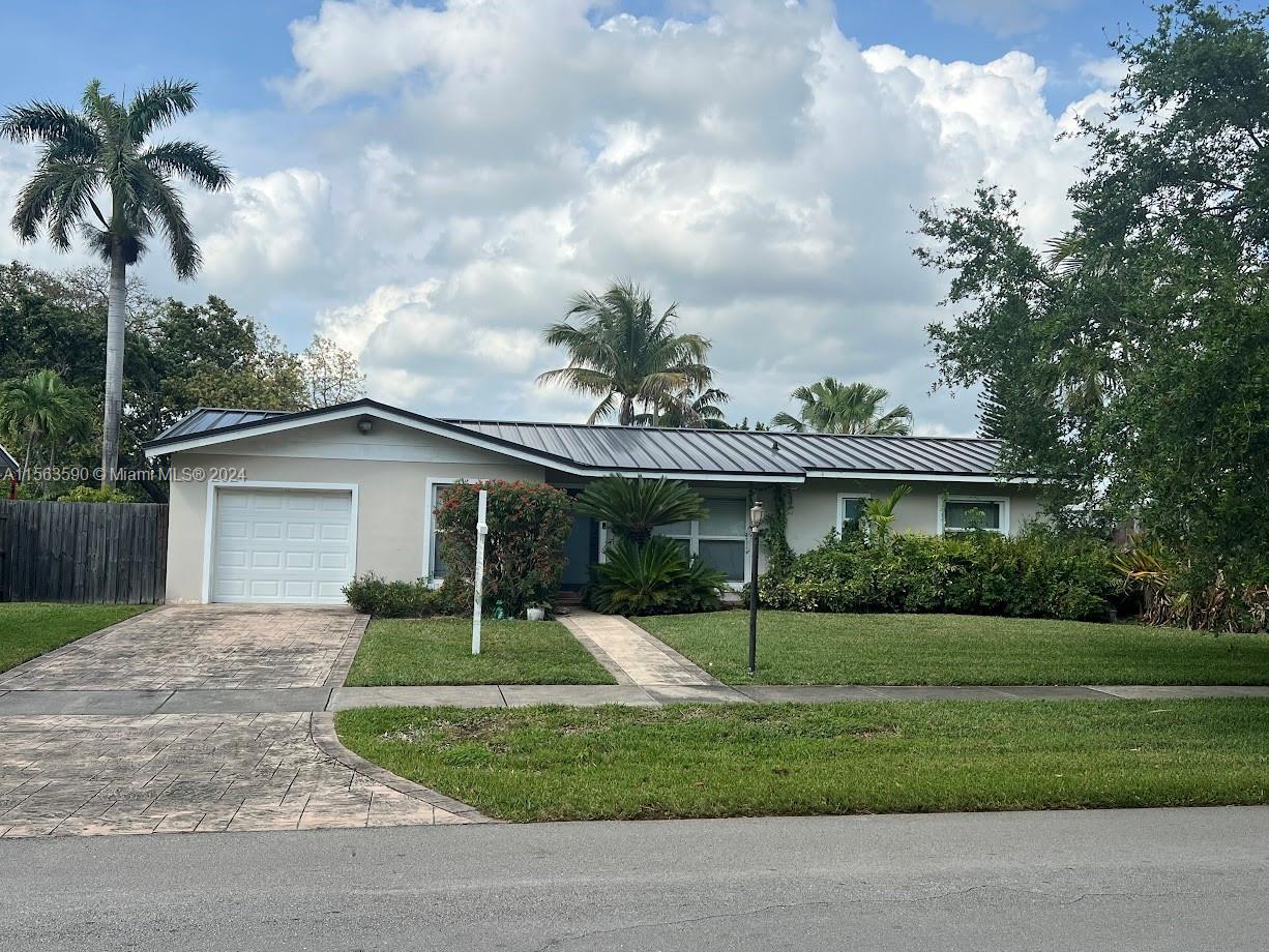 This impressive home in Cutler Bay offers luxury and functionality with 3 bedrooms, 2 full baths, and 1 - car garage. The home opens and flows seamlessly, connecting the living room to the elegant dining room, the cozy family room, with tile throughout the living areas and bamboo wood floors in the bedrooms. The kitchen is equipped with top stainless-steel appliances and a gas range. The master suite, a true highlight of the home, with a very spacious bedroom is complemented by a his and hers closet. The fenced yard is a private haven lush with fruit trees. Exceptional tenants may be approved with only 2 months to move in.