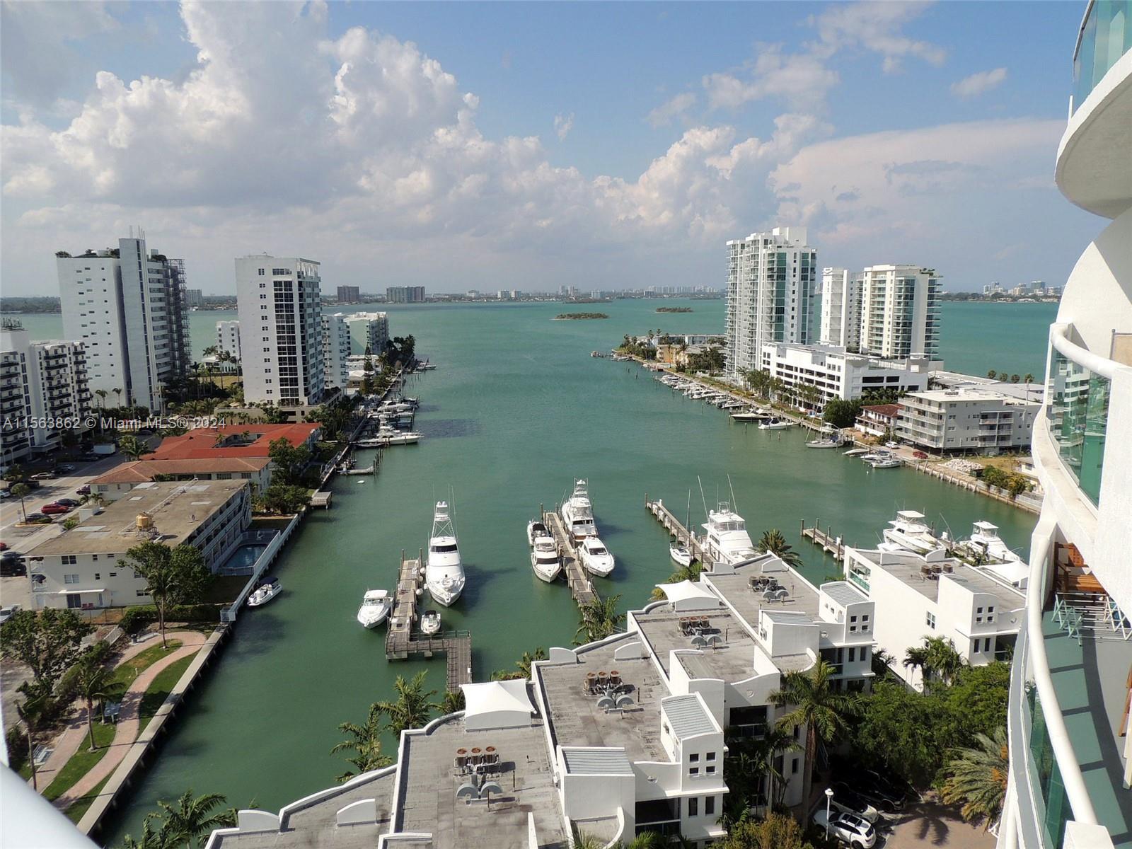 JUST REDUCED, BEST PRICE IN THE BUILDING!! MIAMI LIVING AT IT'S FINEST!! INCREDIBLY SPACIOUS 2 BED /2 BATH UNIT TUCKED AWAY IN BEAUTIFUL NORTH BAY VILLAGE & ONLY MINUTES TO THE BEACH & ALL MAJOR HIGHWAYS!! THIS SPECTACULAR LOWER PENTHOUSE UNIT BOASTS 1,223 SQFT WITH ALL TILE FLOORS, SPLIT FLOORPLAN WITH AMAZING NATURAL LIGHT & LARGE WALK-IN CLOSETS!! UNIT IS VERY CLEAN & FRESHLY PAINTED; KITCHEN HAS GRANITE COUNTERS, STAINLESS STEEL APPLIANCES & PLENTY OF CABINET SPACE + WASHER/DRYER IN THE UNIT! HUGE, NORTH/WEST FACING BALCONY WITH SWEEPING WIDE BAY VIEWS MAKES FOR AMAZING OUTDOOR LIVING!! PET FRIENDLY BUILDING UP TO 25LBS + BASIC CABLE INCLUDED + 1 ASSIGNED/COVERED PARKING SPACE!! WILL NOT LAST, EASY TO SHOW!!