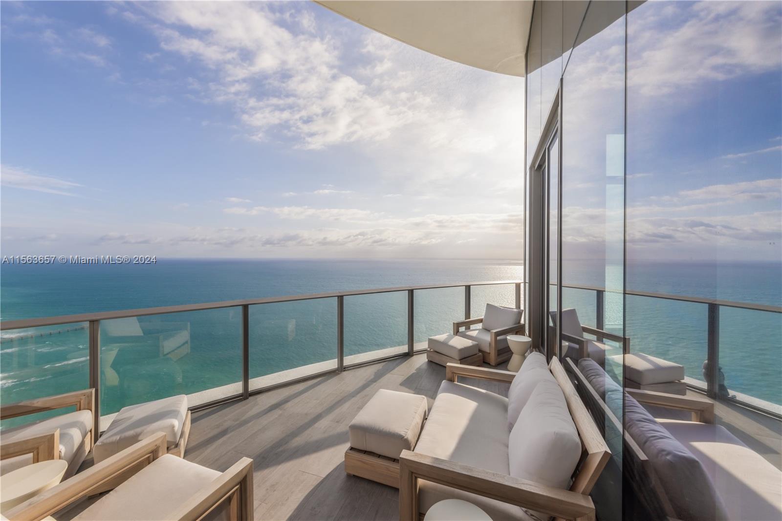 Junior Penthouse at Ritz-Carlton Sunny Isles.  Experience unparalleled luxury in this exquisite architect gut-renovated 3 BR + den, 4.5 BA residence on the 48th floor with 14ft cathedral ceilings. Approx. 3,000 sqft of meticulously designed living space with two large private terraces. Enjoy ocean views from sunrise to sunset through grand floor-to-ceiling windows. Impeccable details include custom millwork, white oak herringbone wood floors, imported marbles & Gaggenau appliances. As previously marketed- in addition to the residence, unit can come fully furnished including a brand new hardly used Bentley Continental GT V8. The Ritz-Carlton Residences Sunny Isles offers world-class amenities including beach access, swimming pools, oceanfront gym, spa, theatre, lounge, fine dining options.