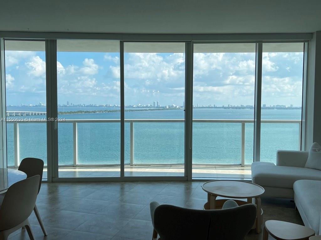 The BEST water view unit in the building!! Enjoy a weak-up every morning with good energy; this is the best unit to live! FULLY FURNISHED, super clean, and ready to move in! This unique water view is located on a high floor, within walking distance from Design District, Publix, Pharmacy, etc... This is the best apartment in Onyx on the Bay, with a big balcony, open glass windows from ceiling to floor from both bedroom and living area, marble floor, impeccable finish, and excellent condition.