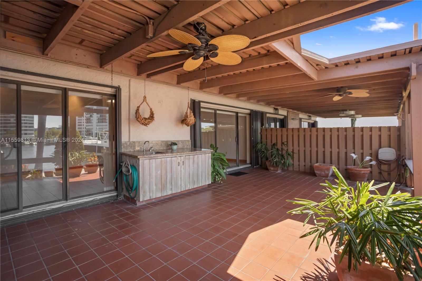 Covered Patio with lots of room to entertain or relax and watch the beautiful sunsets overlooking the deep water canal, no fixed bridges with ocean access.