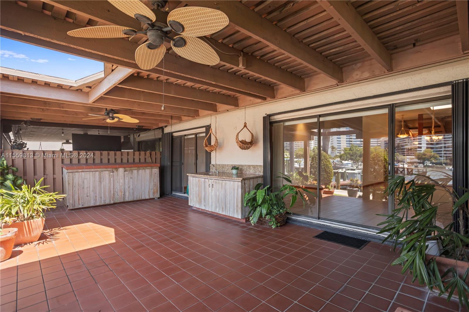 Covered Patio with lots of room to entertain or relax and watch the beautiful sunsets overlooking the deep water canal, no fixed bridges with ocean access.