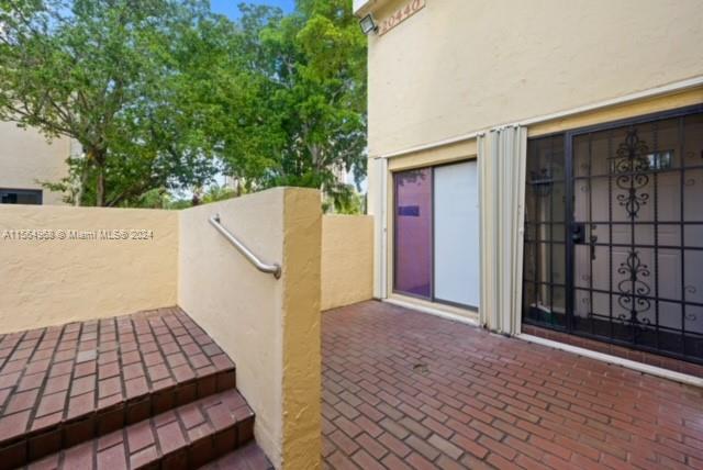 bedroom window with front patio