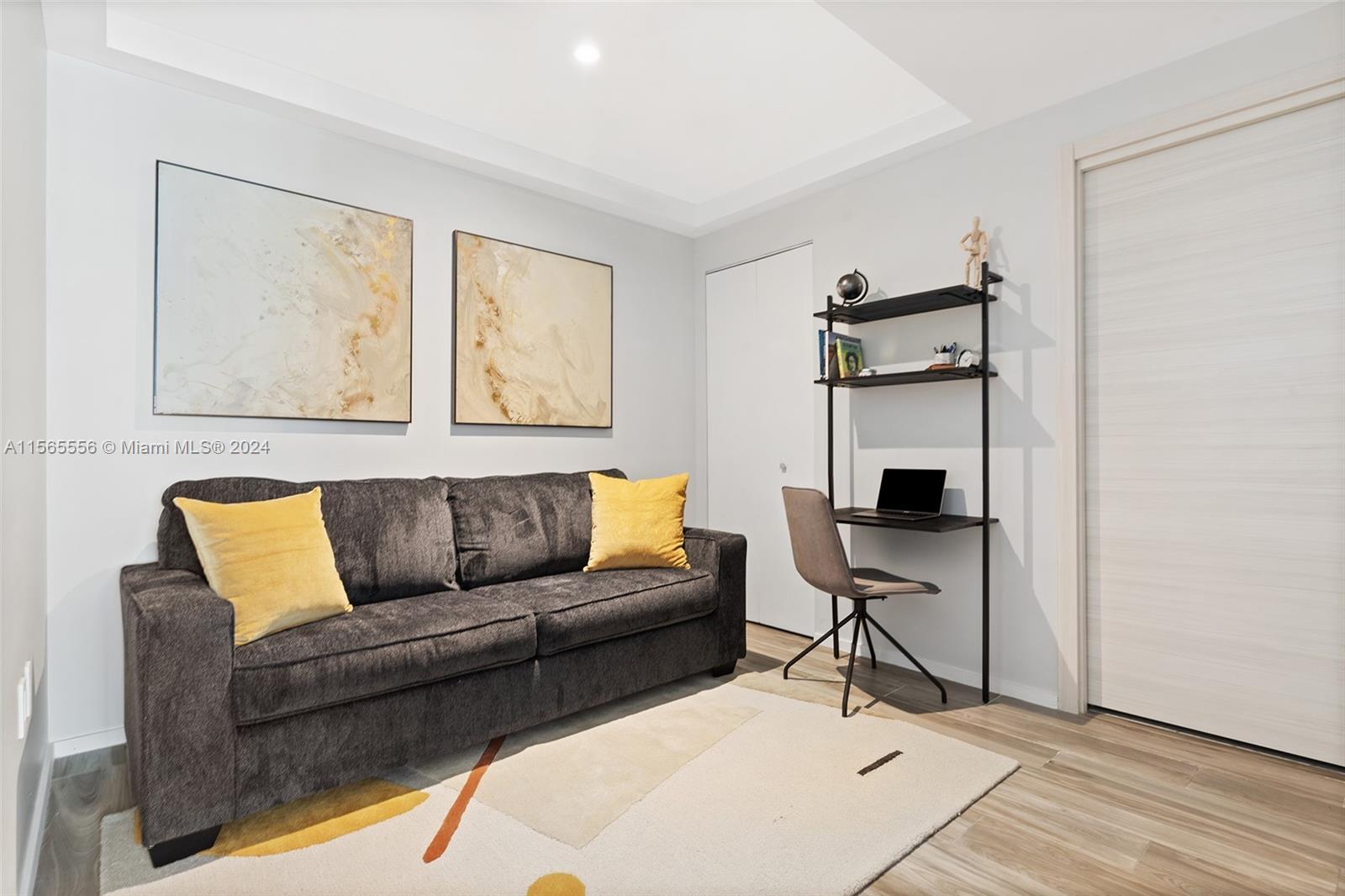 Large den with convertible sofa and full bath.