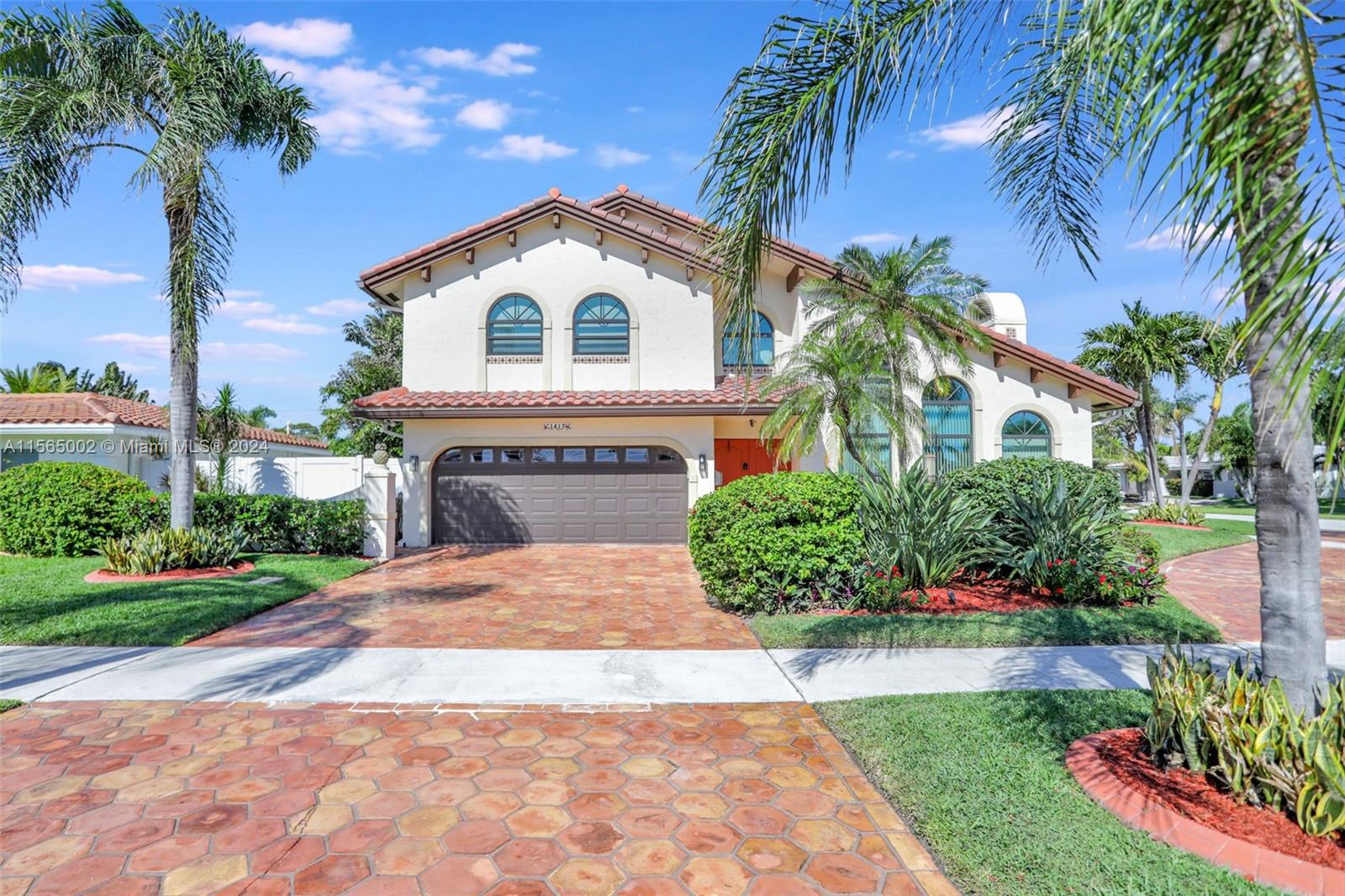 Beautiful 4 BR/ 3.5 BA pool home located on prime corner lot near the intracoastal in the prestigious Sunset East neighborhood. As you enter through the double doors you find custom marble flooring in main living areas, vaulted ceilings, wet bar, brick fireplace, arched windows & a grand staircase. Make your way to the kitchen which offers large cooking island, wood cabinets, granite counters, double ovens & new SS refrigerator. Retreat to your patio & pool area which is perfect for your morning cup of coffee or entertaining. Also features an oversized master suite with balcony overlooking the pool. The master bath features a large whirlpool tub, dual sinks and separate shower. Offers 2nd floor guest suite & two bedrooms on 1st floor. New roof in 2020, partial Impact windows & generator.