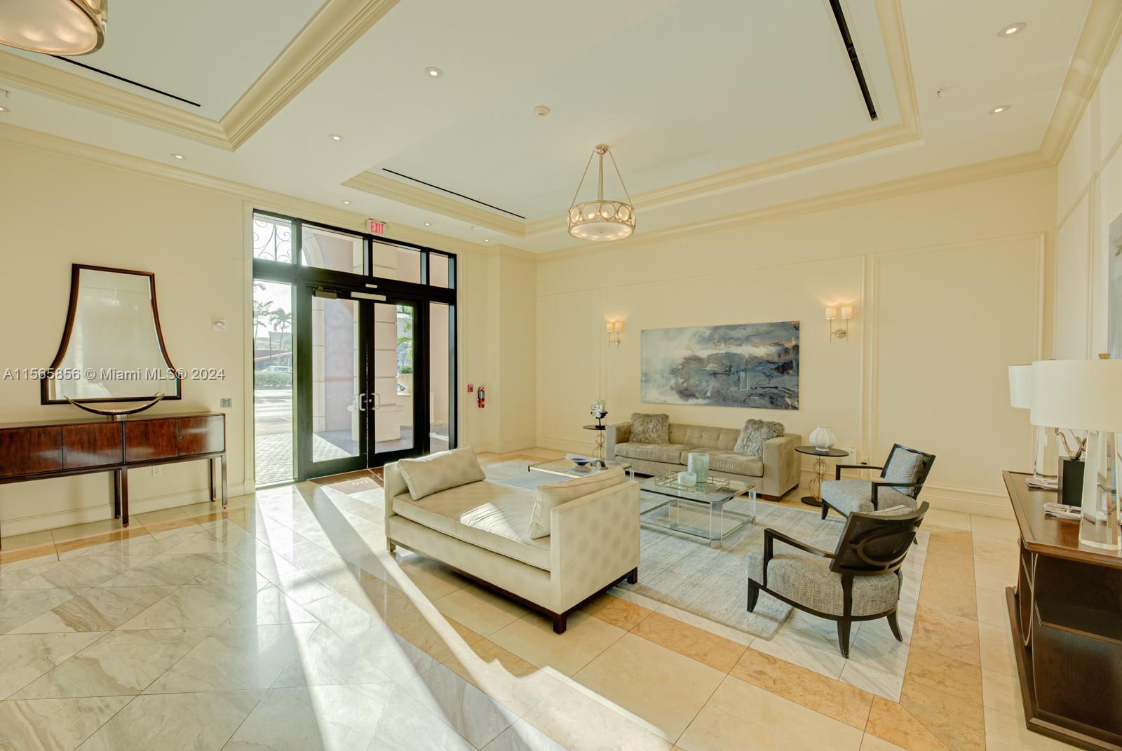 Introducing this spacious condo located in the heart of Coral Gables, offering the perfect blend of luxury and convenience w/spectacular views. This spacious (924 s/f), 1 bedroom, plus den unit features 1.5 baths, providing ample space for comfortable living. The den provides versatility and can be used as a home office, guest room, or additional living space. Residents of this exceptional condo will have access to 24/7 security, fitness center, swimming pool, and secured parking. Features include Italian cabinetry, granite countertops, stainless steel appliances, marble throughout bathrooms, impact windows, and one assigned parking space. Washer & dryer in unit. Either walk or take the trolley to Miracle Mile for great restaurants, shopping & art galleries. A MUST SEE!