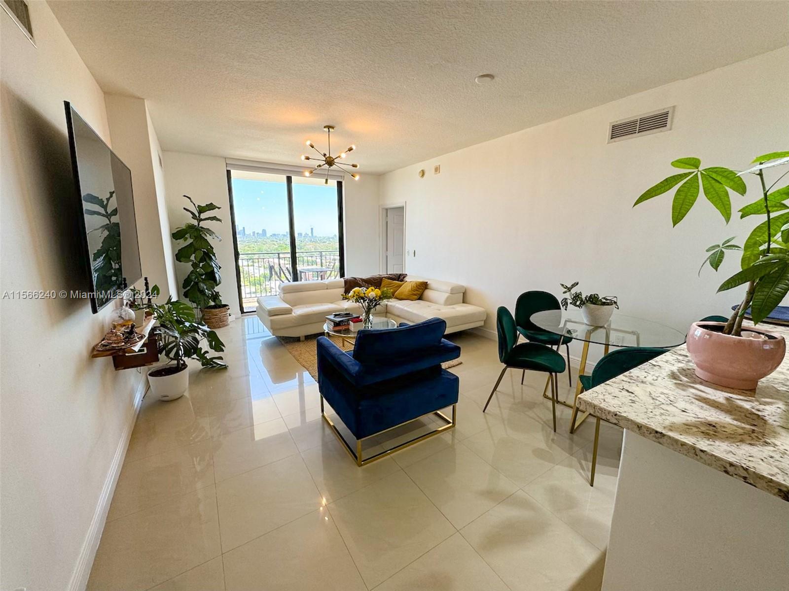 This is one of the best units in Puerta de Palmas at Coral Gables. It has two bedrooms and two bathrooms with spectacular city views. comes with 2 parking spaces and a storage unit. The kitchen features stainless steel appliances, wood cabinetry, and granite countertops. The bathrooms are fully renovated.  Custom-made closets, washer and dryer. The building offers many amenities, including 24-hour security, valet parking, a gym, a pool, and more.