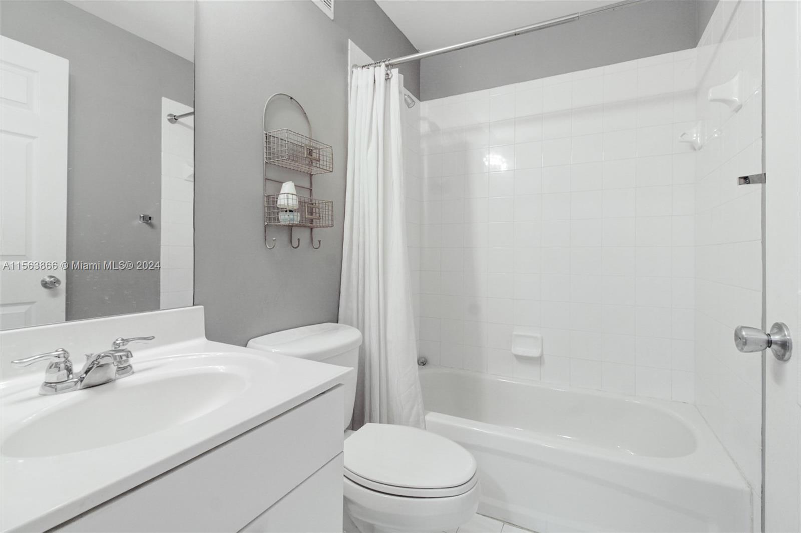 Master bath complete with separate stand-in shower and roman soaking tub feathered here.