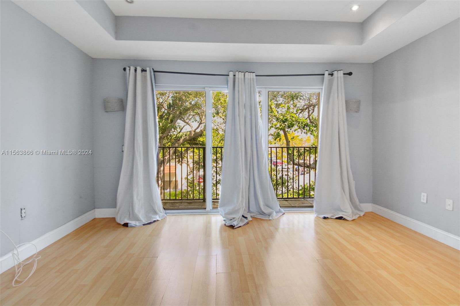 2nd bedroom with ample lighting.