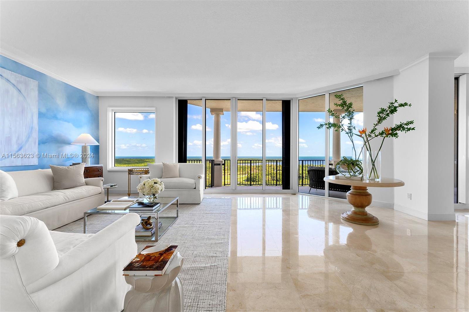 Luxury living awaits at the Verona building 12th floor Lower Penthouse, your private oasis in Deering Bay. This 4-bed, 4.5-bath condo offers 4,480 sq ft of spacious living. Enjoy breathtaking Biscayne Bay views and the Deering Bay community from the moment you step inside. Open floor plan and high ceilings create a grand feel. Relax in the main suite, entertain in the expansive living areas, or work from the dedicated office. Other features include custom kitchen with top-of-the-line appliances, wet bar, hand painted murals on living room wall and dining/kitchen ceilings, private enclosed garage with AC and storage, golf cart parking space and private elevator. Unwind on the 1,000+ sq ft of terraces and soak up the South Florida sunshine. Club membership and Boat slips available.