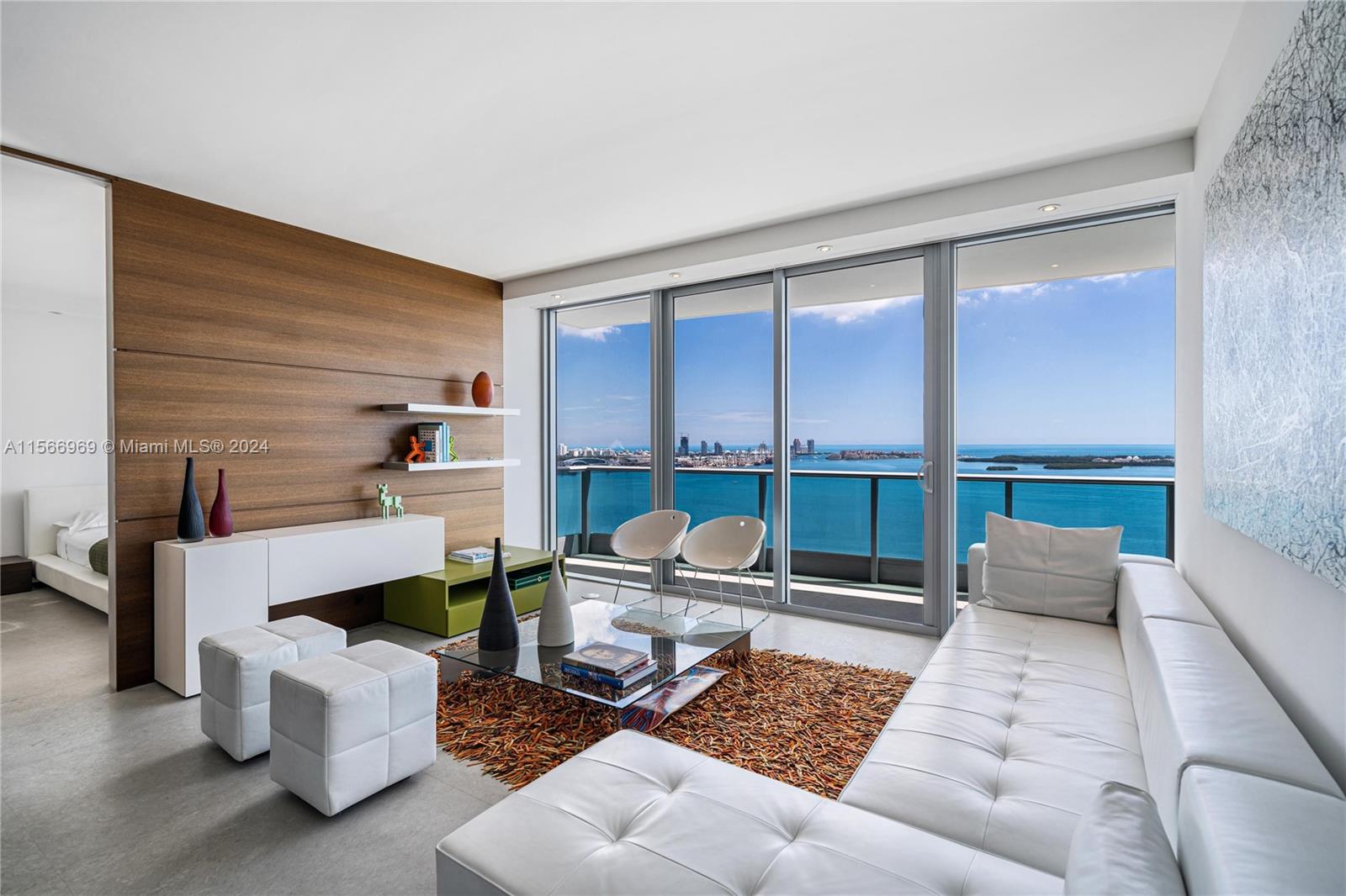 This 2-bedroom plus den/3-bathroom unit on the 40th floor is move-in ready and truly stunning. It's fully furnished
and offers 1,730 square feet of living space, including a spacious terrace with panoramic sunrise views spanning
Biscayne Bay, Key Biscayne, Miami Beach, the Atlantic Ocean, and Miami itself. Inside, you'll find beautiful stone
floors, open living and dining areas, and a sleek gourmet kitchen equipped with top-of-the-line appliances, all with
incredible views. The bayside primary suite provides direct terrace access and features an exquisite bathroom with
marble floors and walls, dual sinks, a separate shower, and a spa tub. Additionally, Jade Brickell offers a wealth of
5-star amenities, including a 24-hour concierge, assigned parking, valet services.