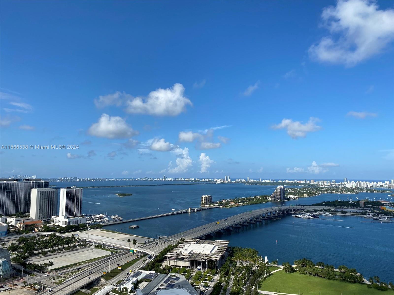 Discover waterfront living in this 1BR/2BA condo with direct bay views from the living area to the master bedroom. Located across from Kaseya Arena and a block from i95, enjoy Downtown Miami's best. The unit features tile floors, floor-to-ceiling sliding impact glass doors, and an expansive 192sf balcony. With two full bathrooms and ready to move in, this home offers convenience and style in a prime location.