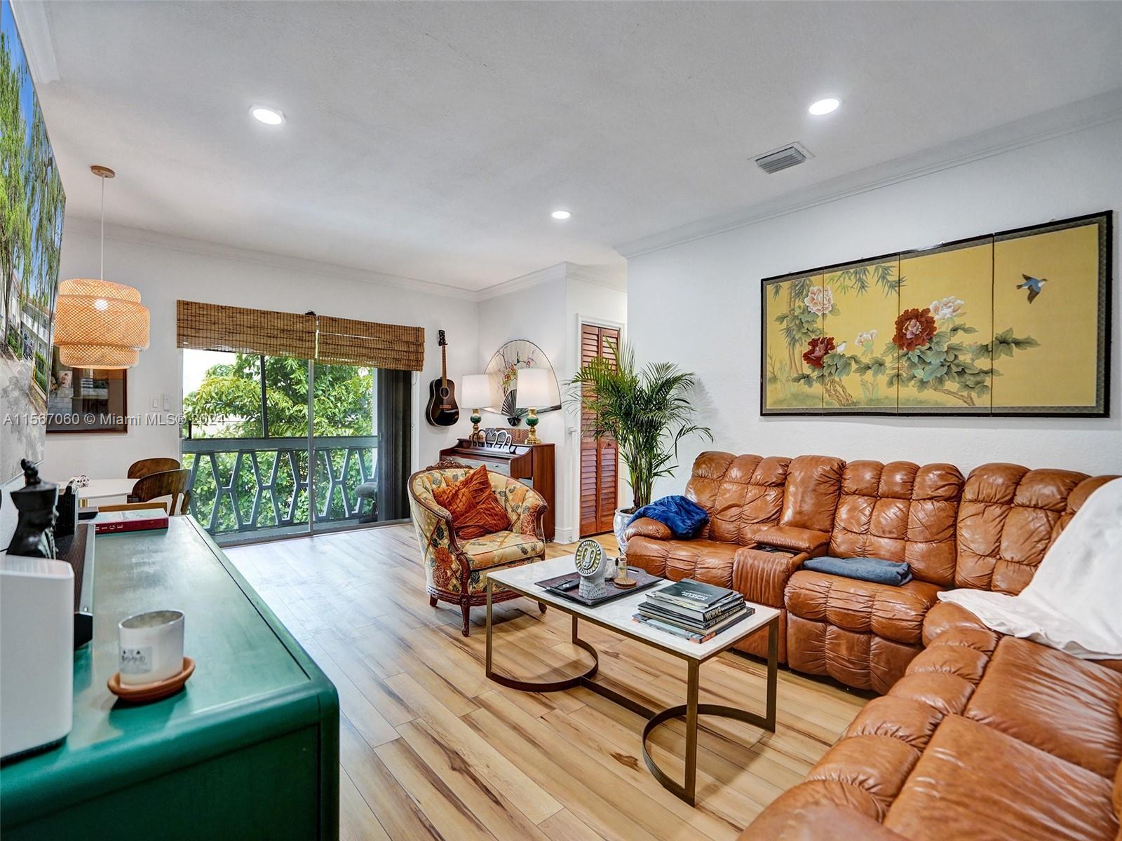 Spacious second floor 2-bed/1-bath condo on Edgewater Drive in Coral Gables. This unit boasts luxury vinyl flooring, stainless steel appliances, butcher block counters, and hurricane shutters. Enjoy the screened balcony, a community pool, and one reserved parking. Building has community washers & dryers. Desirably located near Coconut Grove, Merrick Park, and the University of Miami.