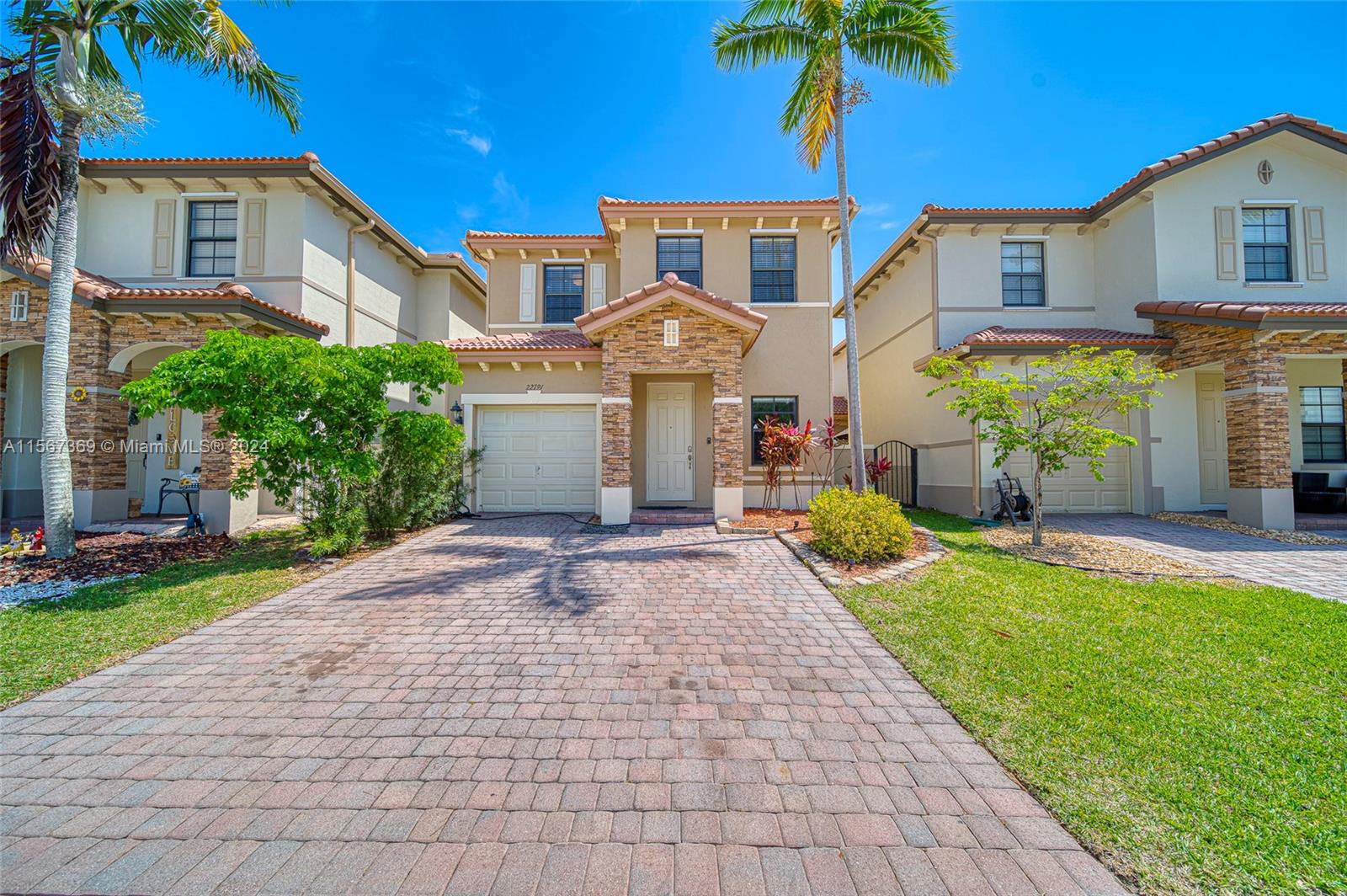 Move-in Ready  "Jasmine" Model in Trellis at the Isles of Bayshore. Renovated 3 bedroom 2.5 bath home with a bonus room on the 1st floor.  This two-story coach home features a covered terrace, brick paved patio with artificial turf in the backyard with a convenient walkway on the side great for entertaining. Advanced Smart home features including Electronic blinds, a wireless door lock, programmable thermostat, and the ability to control lights throughout the home. Other features include a new Stainless steel refrigerator and matching dishwasher, high-efficiency A/C system,  updated flooring, and freshly painted interior. The partially converted garage still has plenty of usable storage space and includes a Smart home compatible garage door opener.  Plenty of guest parking.