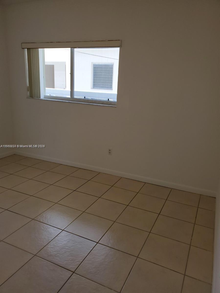 Bedroom easily accommodates a King-Size bed; not shown are newer/2020 window solar-shades