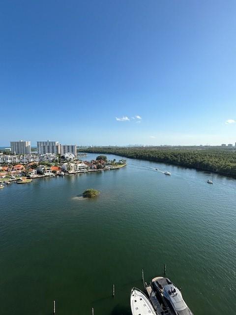 Just listed this fantastic unique unit in one of the most prestigious locations in Miami - Sunny Isles. Amazing views of  Intracoastal, ocean, Oleta Park, and city. It is fully furnished in a very contemporary Miami style. Offers one of the most desirable floor plans Flow=thru with bedrooms separated from the living area. 3 bedrooms 2 1/2 baths and 2 car garage. Italian porcelain all through the unit. The luxury building offers a beautiful and sunny swimming pool, spa, gym, tennis courts, marina, 24-hour concierge, and walking distance to restaurants, and shopping, close to Aventura and  Ball Harbour mall. Just one block from the beach. If you are looking for a resort lifestyle, this is it.