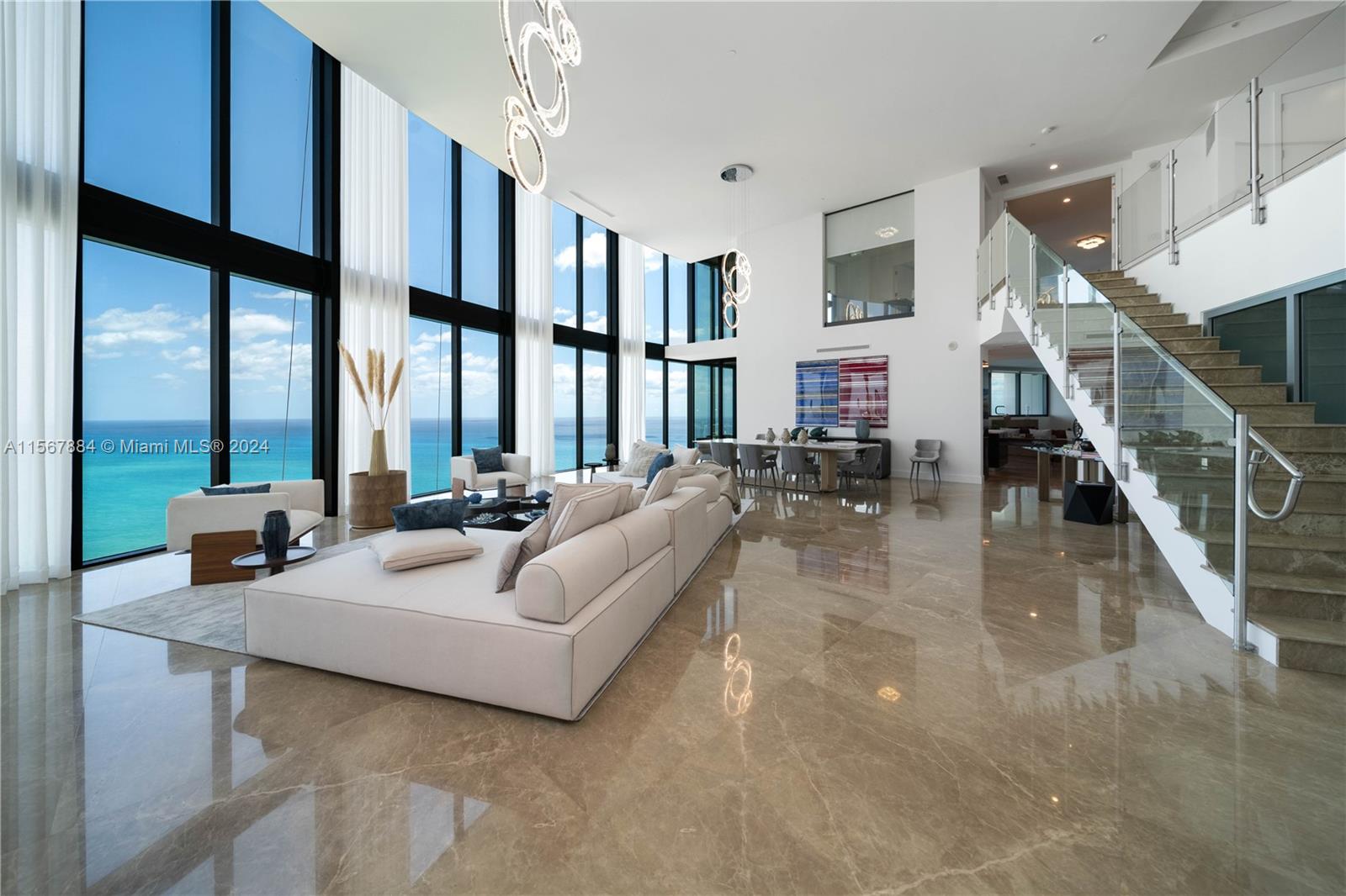 Last Spectacular Duplex PH unit available with best view in the building.  Two story residence in Porsche Design Tower with 4 car garage, internal elevator, private pool, 2 balconies, 2huge master bedrooms, sleek designer kitchen, Emperador Spanish Marble 48/48, unobstructed ocean and intracoastal views, private beach with sunset, pool yoga center, state of the art gym, with simulator technology (VRX motion Z -55 racing), movie theater restaurant and more! Monthly maintenance to be checked by buyer realtor