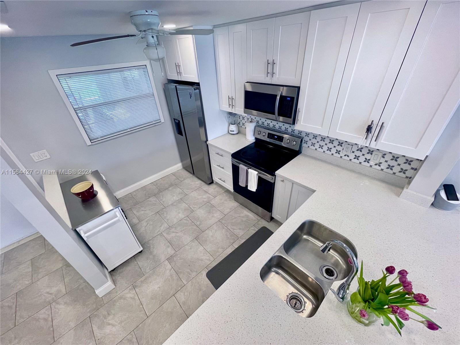 7502 NW 86th Ter 202, Tamarac, Florida 33321, 2 Bedrooms Bedrooms, 1 Room Rooms,2 BathroomsBathrooms,Residential,For Sale,7502 NW 86th Ter 202,A11564427