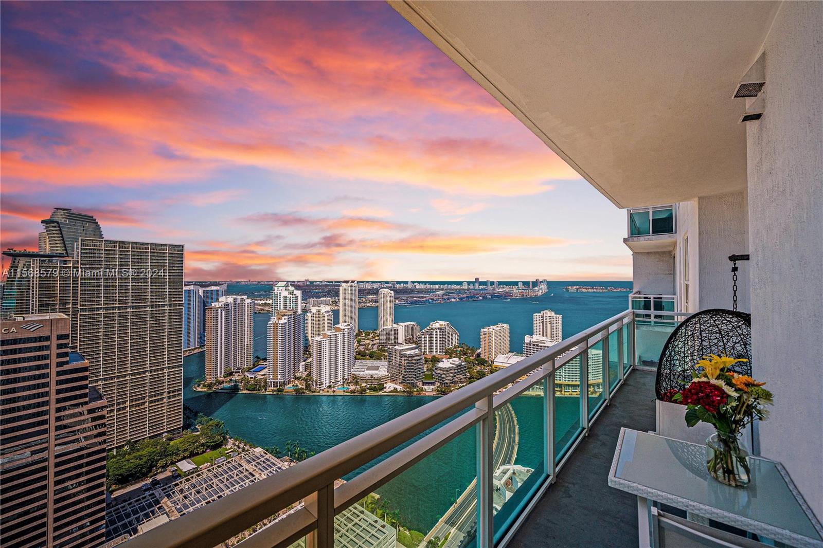 Experience elevated living in this stunning 50th-floor home in the sky at Plaza on Brickell. This residence features 10-foot ceilings, porcelain flooring throughout, upgraded lighting, and motorized window shades. Recently updated kitchen appliances, LG WashTower, and AC ensure modern comfort. Each bedroom boasts a custom walk-in closet and en suite bathroom. Enjoy breathtaking waterfront and city views from the balcony. Amenities include 24-hour reception/security/valet; fitness center; outdoor oasis with two swimming pools, meditation garden, and cushioned daybeds; spa; private movie theater, and multiple resident lounges and workspaces. Live in the heart of Brickell with restaurants, shops, parks, and entertainment at your doorstep. Available May 28. Visit in-person or with our 3D tour.