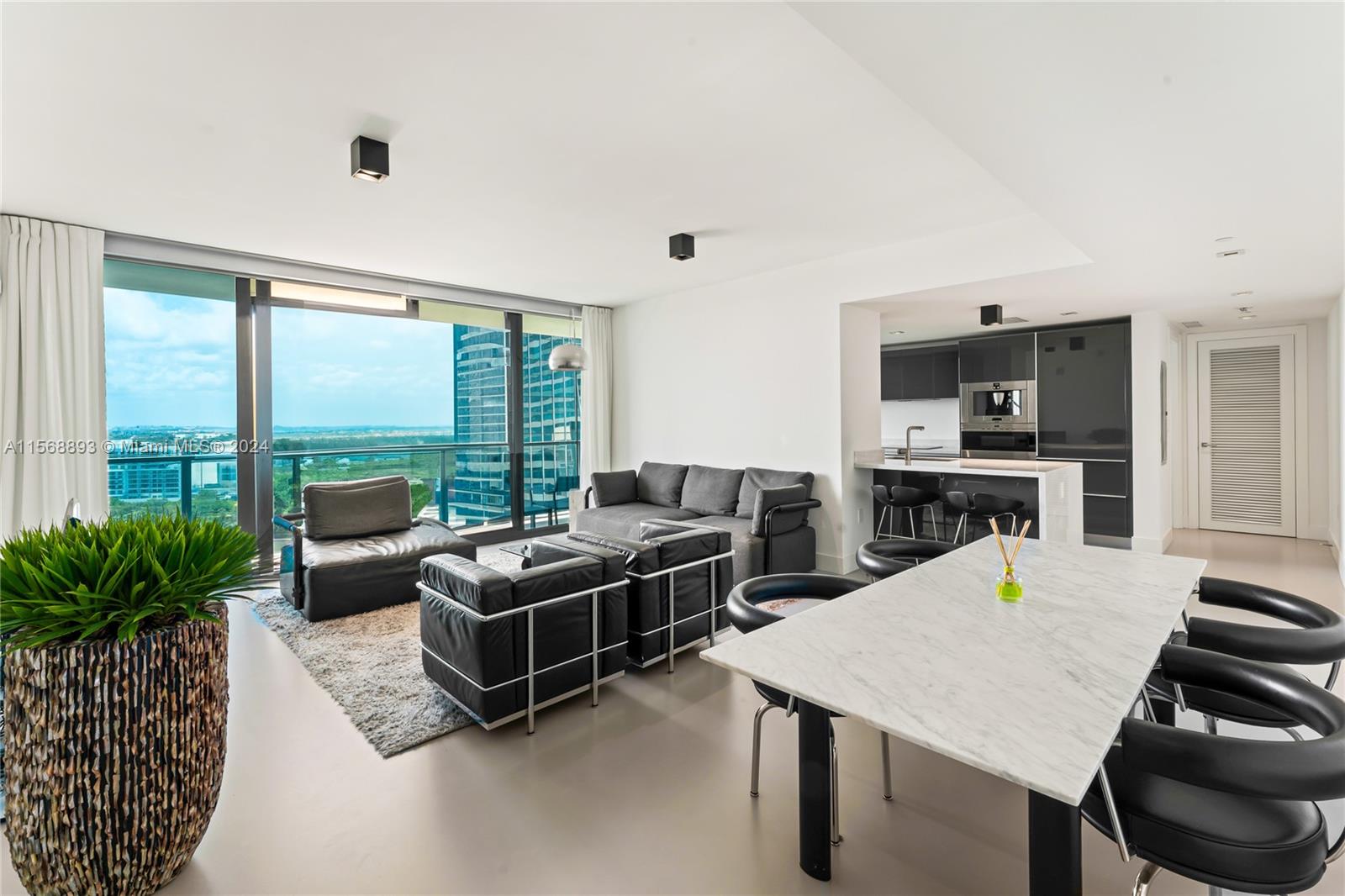 Echo Brickell #1905, nestled in the heart of Miami’s most prestigious neighborhood, is a beacon of luxury living and architectural innovation.  This 1,123 S.F. 2/2, split floorplan has epoxy flooring throughout, Poggenpohl Kitchen cabinets an expansive terrace with summer kitchen and smart home technology and 2 assigned parking spaces. The building's lavish amenities include a vanishing-edge pool overlooking the bay, a state-of-the-art gym, full concierge services, and a pet-friendly policy with a dog walker on call. Whether it’s the vibrant culture, the thriving business environment, or the serene ocean vistas, Echo Brickell is not just a residence—it’s a gateway to the epitome of opulent urban living.