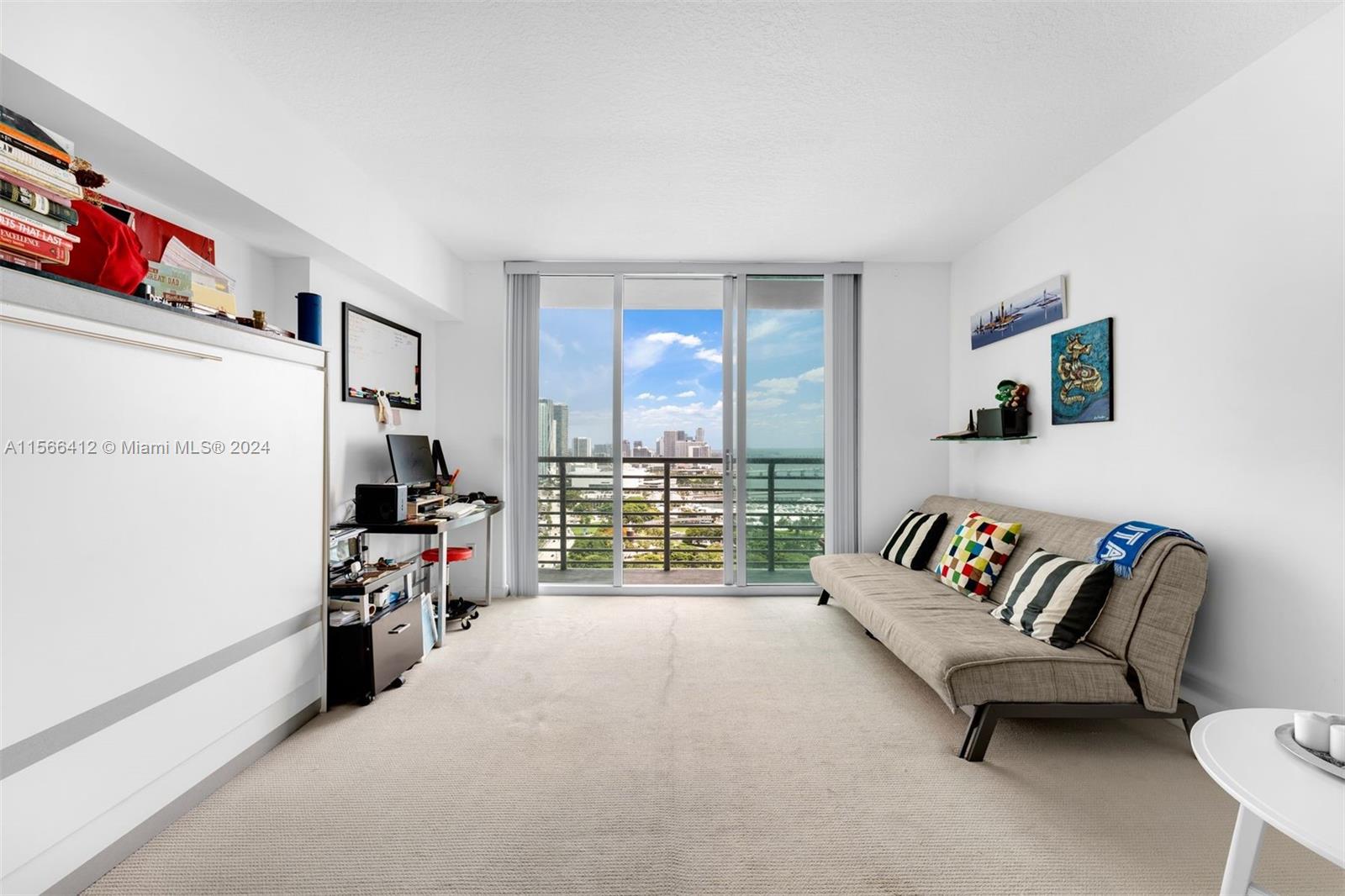 Furnished studio located on the 33rd floor of One Miami West. Unit includes a large Murphy bed, convertible sofa, and mounted flat-screen TV. Breathtaking views of Biscayne Bay and the Downtown Miami skyline. Rent price includes basic cable TV, water, and one (1) assigned parking space.