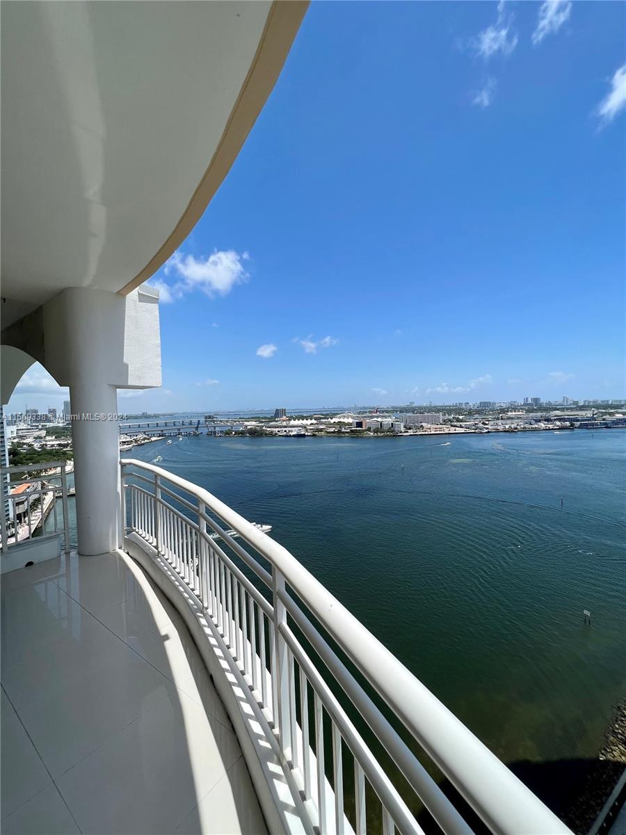 Top-scale building, Luxury living at its finest. Spanning 1400 square feet. 2 parking spaces and 1 storage are assigned to this unit. 2 bedrooms and 2,5 baths, offering a blend of space and comfort. Marble and laminate  floors that grace the expansive living space. Natural light and stunning views of the surrounding cityscape and Biscayne bay. Safety and security are paramount, with round-the-clock surveillance and 24-hour security. Enjoy access to an array of amenities designed to enhance their lifestyle, including a 24-hour concierge. From its exceptional features to its unparalleled amenities, this property offers a truly extraordinary urban living experience.