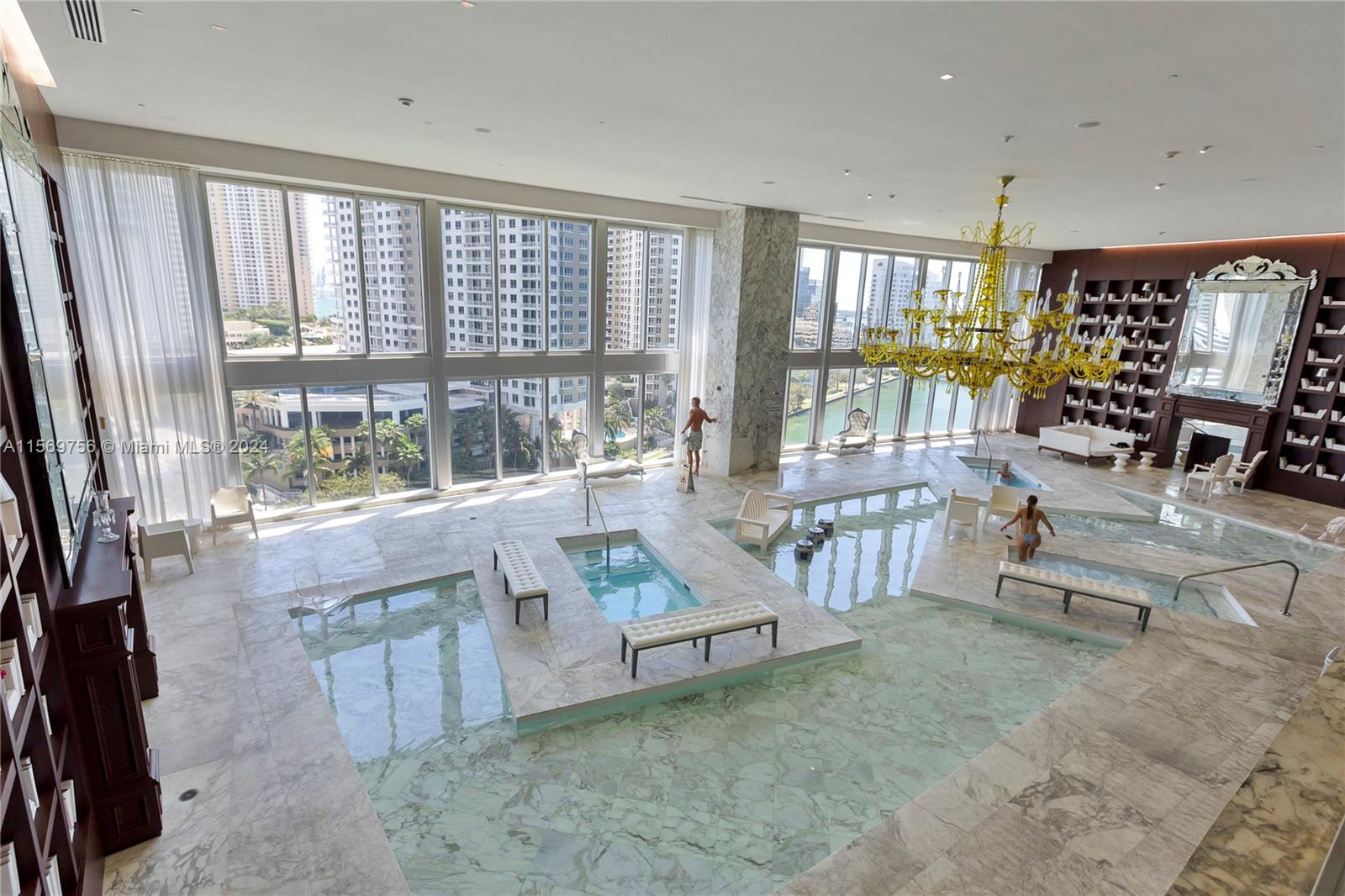 Discover luxury living in Brickell's Icon Building with this waterfront studio! Enjoy impeccable interiors and stunning views. Dive into a supersized pool or relax on the deck overlooking Biscayne Bay. Indulge in a spa and fitness center that rivals five-star resorts, complete with three whirlpool tubs and cold plunge pools, steam room and redwood saunas… a full wellness facility. Walk, jog, or unwind in adjacent parks or the sprawling two-acre terrace above the bay, featuring a 300-foot pool, hot tub, and outdoor fireplace. Two bayside restaurants, 24-hour concierge, and the parking in the same level of the condo enhancing your vibrant urban lifestyle. Your new home offers breathtaking views of downtown Miami and beyond.