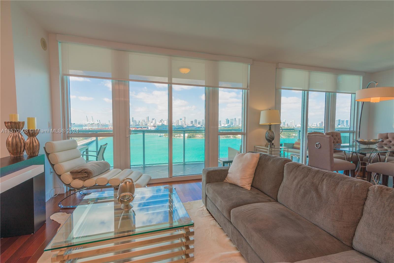 Enjoy a spectacular wide bay view of the Miami Skyline in this gorgeous 1 bedroom and den with 2 full bathrooms. This unit has beautiful kitchen, walk in closets, and a jacuzzi tub. There is great lighting and amazing modern furnishings. The Bentley Bay is close proximity to grocery stores, dining and the South Beach neighborhood. There is a beautiful pool, gym with updated equipment, front desk attendants, and valet services.
