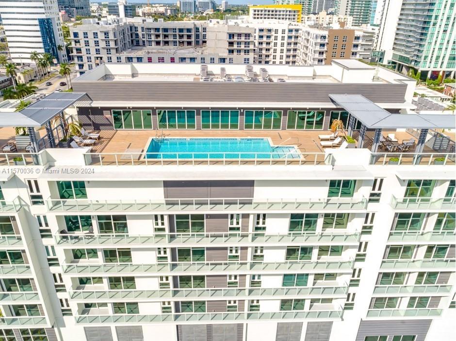 Great 2 bedroom/2 bathroom in 26 EW Condo with 1 parking space. Excellent location just minutes away from Design District, Wynwood, Kaseya center. Modern Kitchen, tile floor, impact windows. Large balcony with awesome city views and partial water views. Rooftop pool, fitness center, party room and more.