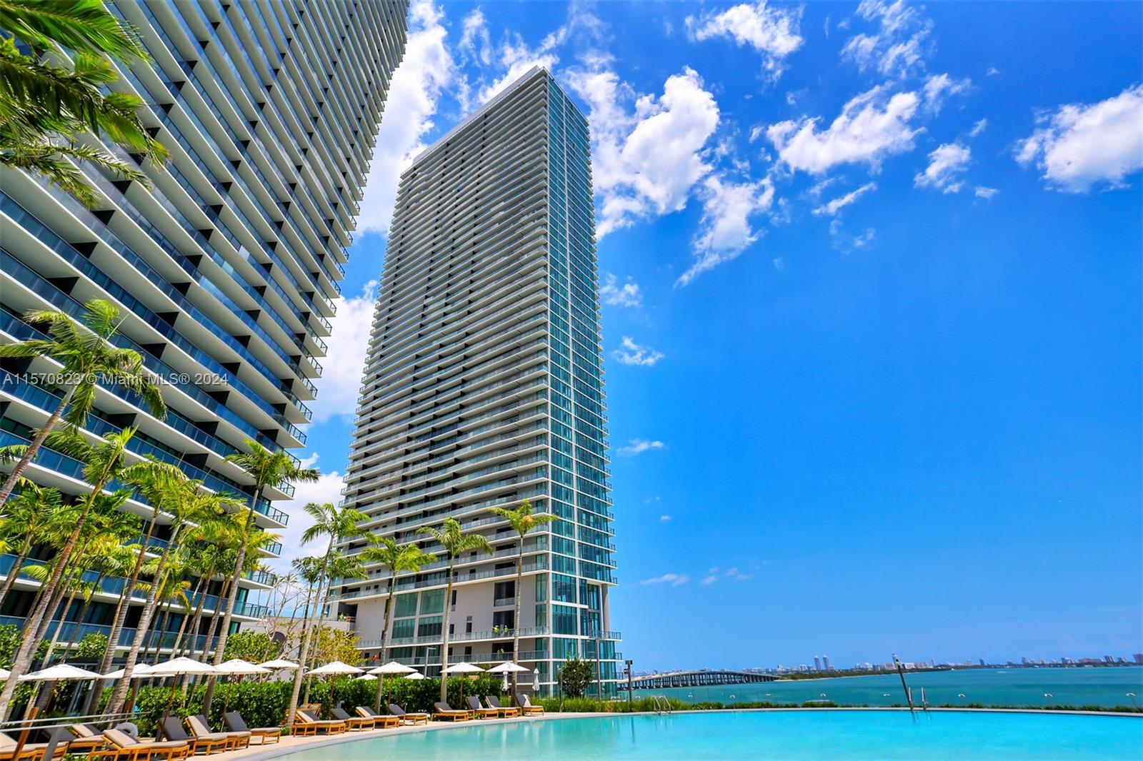 Send full offers including credit report, 3 last month income statements,ID and CTL. Fee cleaning $ 350/pet 600 nonrefundable. Stunning residence! Floor-to-ceiling glass, tile floors, Boch/Subzero appliances, custom closet & shades. The amenities of Paraiso Bay that features a beautiful pool, spa, movie theater, social room, billiard & children's room, minigolf course & more. 1 parking.