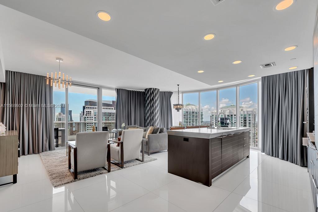 EPIC MIAMI Condo! A world class masterpiece on the entrance of Miami River. Enjoy sweeping, 39th floor views from Bay to River to City. You can take it all in from your wrap around balcony or any of the floor to ceiling windows throughout and its FULLY FURNISHED! High end kitchen with Sub-Zero & Miele appliances with an expansive island counter, overlooking the large open living spaces. The primary suite is a dream with its own balcony space and a bathroom that is sure to wow you daily! Dine and parrty downstairs at the World Renowned, Zuma or Area 31 restaurants. Sweat it off or get pampered at PRIVAI Spa and fitness or take a dip in the 16th floor pools! EPIC has it all! Valet and concierge in building!