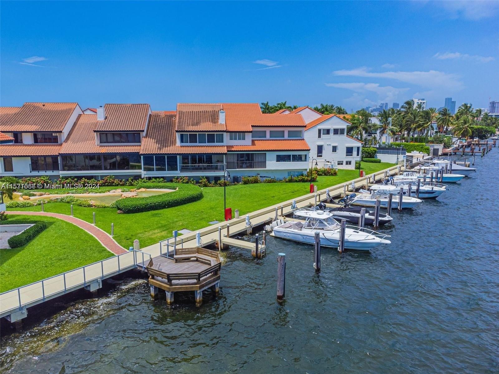 On highly desired South Bayshore Drive, L'Hermitage is a private 24hr guarded Waterfront Community in Coconut Grove of 75 tri-level luxury residences. FULLY renovated with new roof, surrounded by lavish landscaping, enjoy resort-style living, waterfront sports w/Bayfront Access Boat Dock, Pool House (Outdoor Kitchen/Jacuzzi/Steam Rm), 2 Tennis courts, just minutes away from Miami's BEST schools/parks/shops & beaches. 

Extra-large house (biggest in the community) - bigger than tax roll with 4,535 Sft