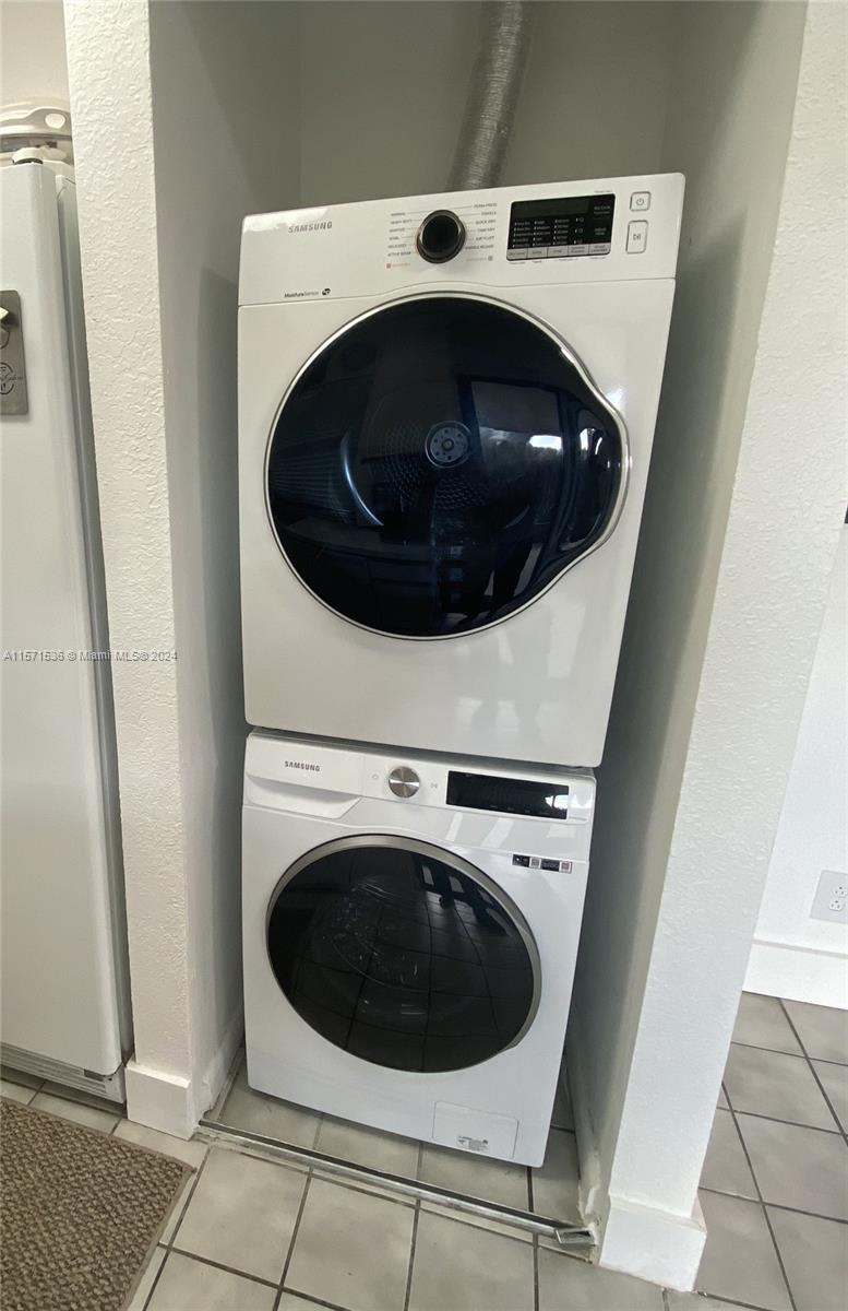 BRAND NEW stackable washer and dryer
