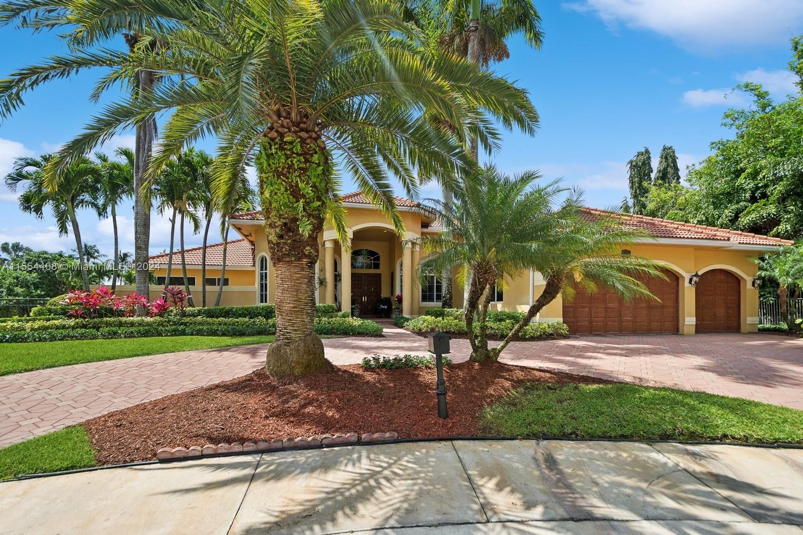 This exquisite home embraces a one-of-a-kind expansive ½ acre cul-de-sac lot, with scenic lake & golf views in the prestigious WHCC.The grand entrance has dramatic 20 ft. ceilings, LED lighting, and Sonos sound system throughout. This spectacular residence features a total of 5483 s.f. including 5 bdrms,5 baths, FR with solid mahogany wall unit, eat in kitchen & separate dining area, all with elegant marble and hw flooring. Spacious LVRM showcases a sunk in wet bar, the owner’s suite boasts his and hers private bthrms, sitting area, & large walk-in closets.The home extends its elegance outdoors with a spacious patio, heated pool, oversized spa, & large fully fenced grassed area for kids/pets! 3-car garage with a/c exercise room and new roof 2017.This exceptional property is a rare find!