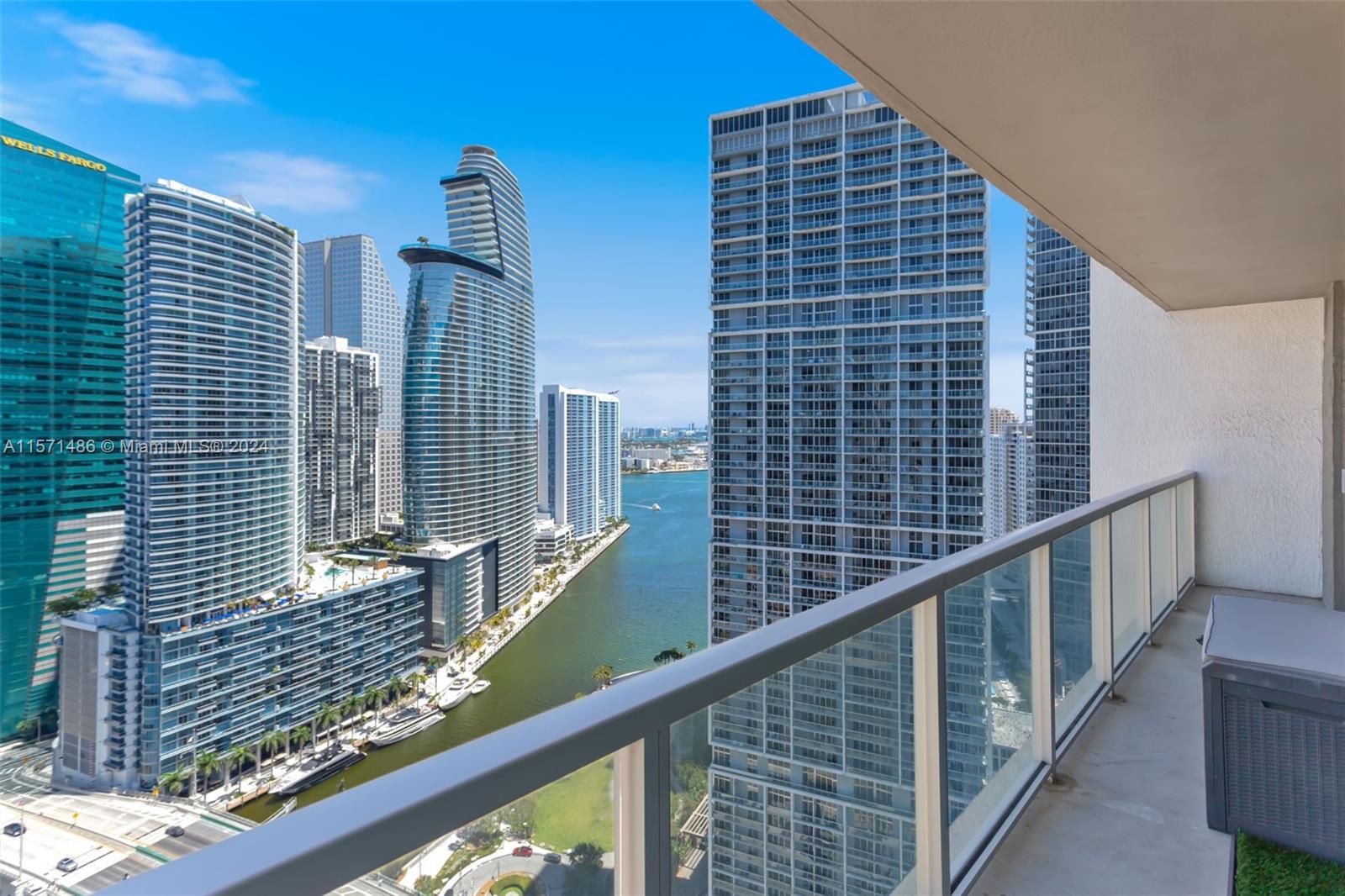 Spacious North East Corner Unit in Brickell with views of Biscayne Bay all the way to the Atlantic Ocean. Walking distance to all the great restaurants in Brickell, including Sexy Fish and Zuma, and right across the street from all the shops, dining, and nightlife at the Brickell City Center. Enjoy nearly 1,200 sq. ft. of privacy in this Corner Unit with a large Corner Balcony, spanning the entire width of the unit, and extra windows along the western walls which let in lots of natural light! Open Floor Plan with Kitchen flowing into Living Room. 2 Full Bathrooms. Long corridor off Foyer leading into Living Room offers additional privacy. Amenities include a true Rooftop Pool on the 42nd floor, gym, spa, media room, community room, and more!