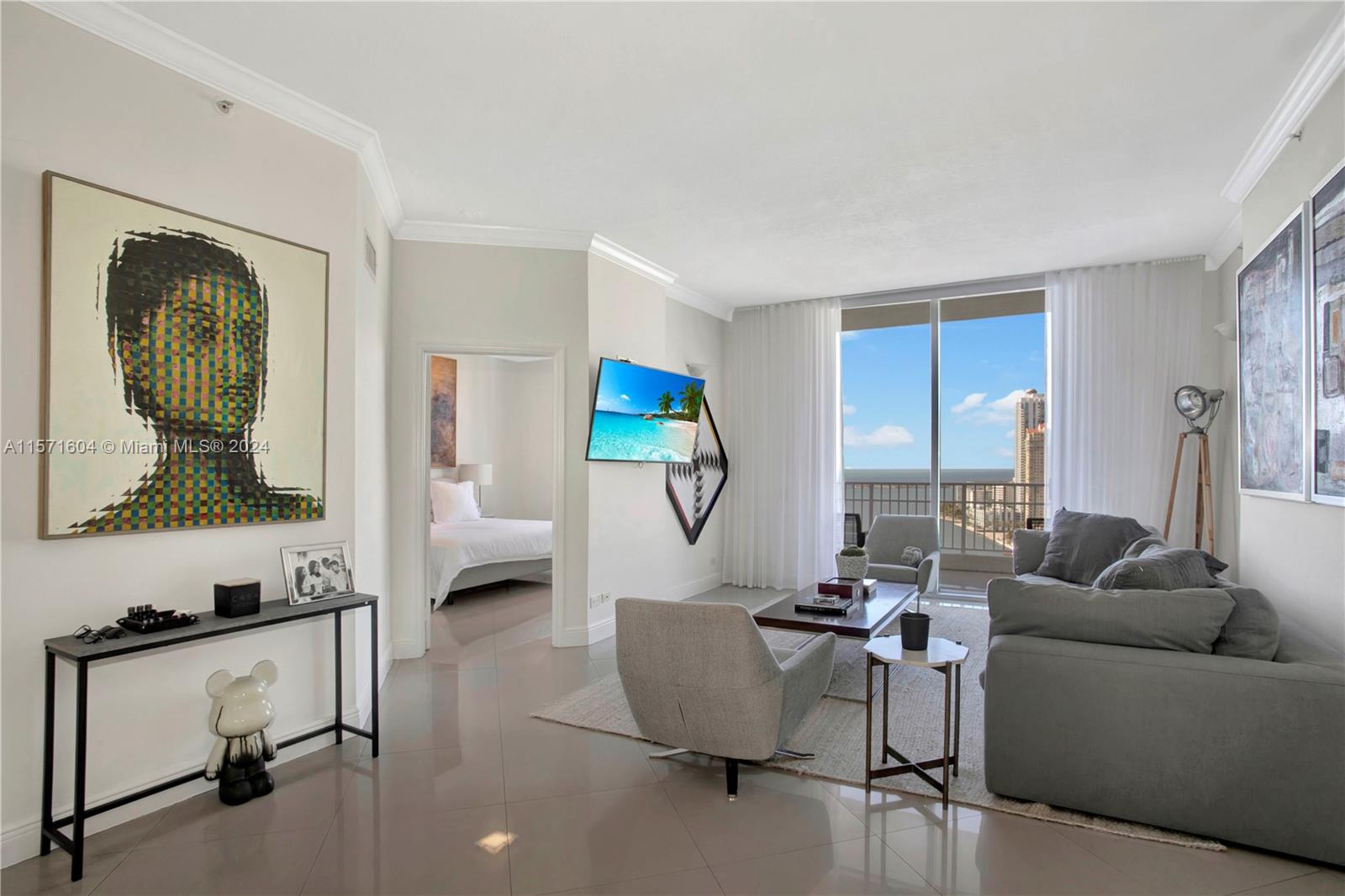 Spectacular Penthouse at Courvoisier Brickell Key. This spacious 3 bed/2.5 bath unit laid out over 1,573 SqFt offers wonderful water, bay & city views. 10-foot ceilings, porcelain flooring throughout, ample kitchen w/ granite countertop and stainless steel appliances, large walk-in closets, 2 parking spaces, 2 storage units. Great building amenities incl heated pool and jacuzzi, 2 story fitness center, racquet / squash court, billiards, media and conference room, shops & restaurants.